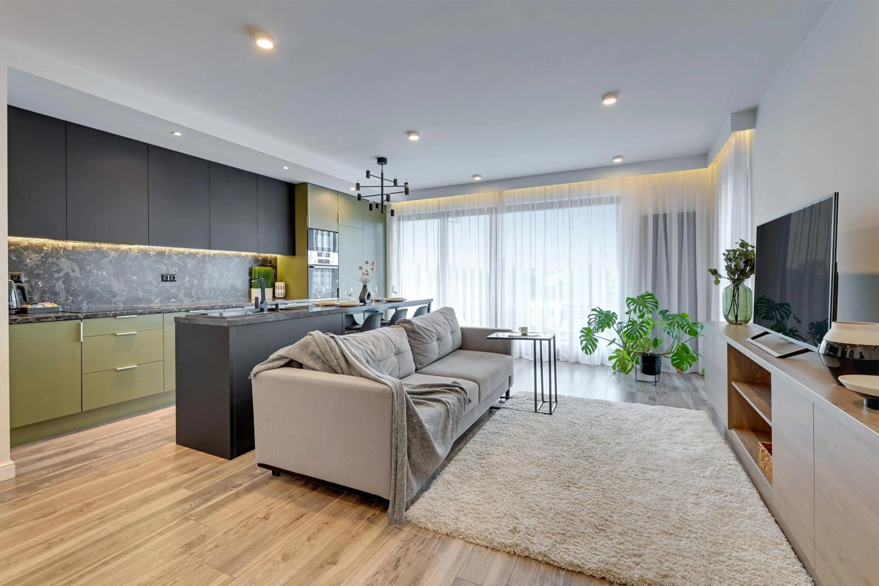 TV and multimedia in Aura - Riverside & Parking by Downtown Apartments