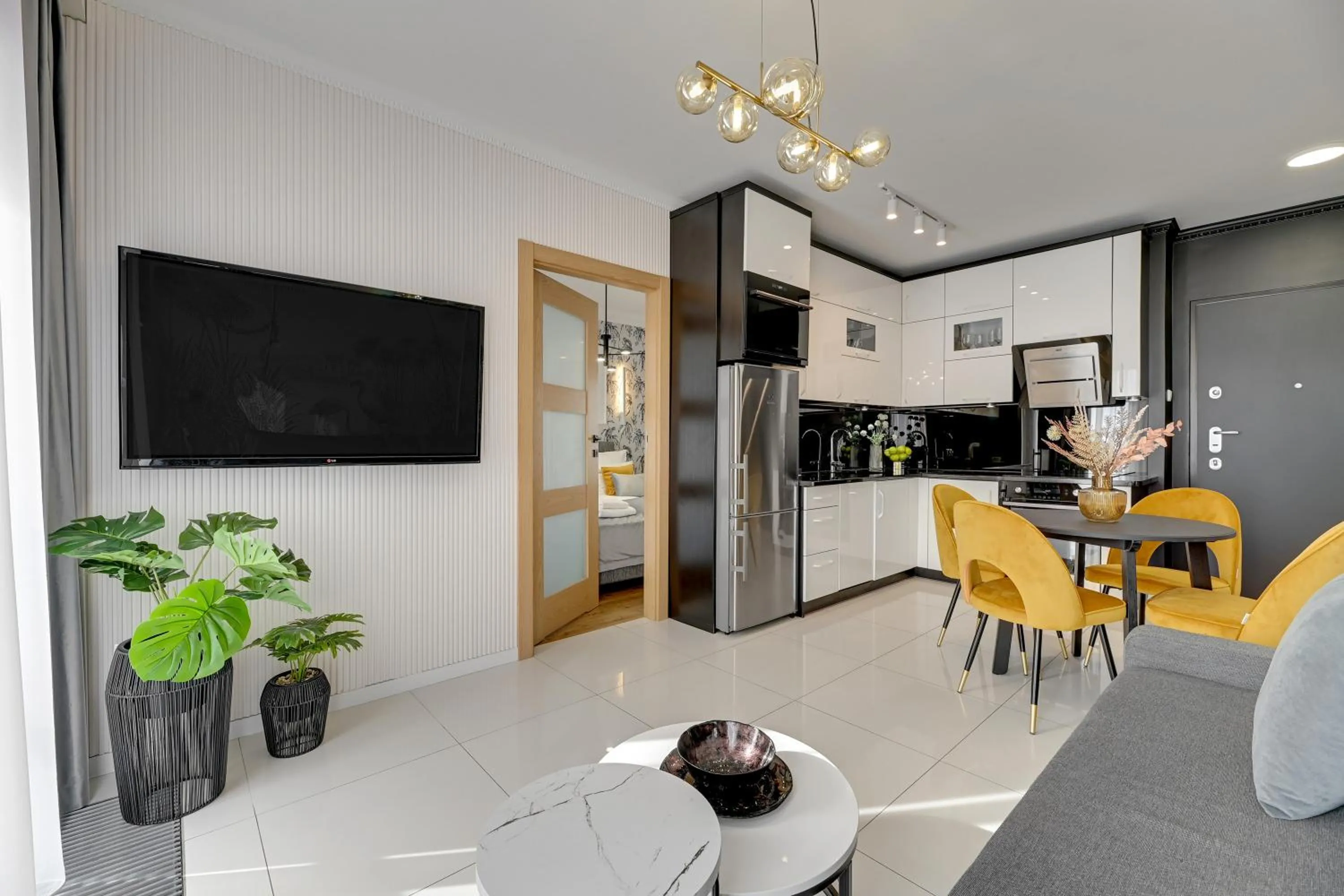 Communal lounge/ TV room in Aura - Riverside & Parking by Downtown Apartments