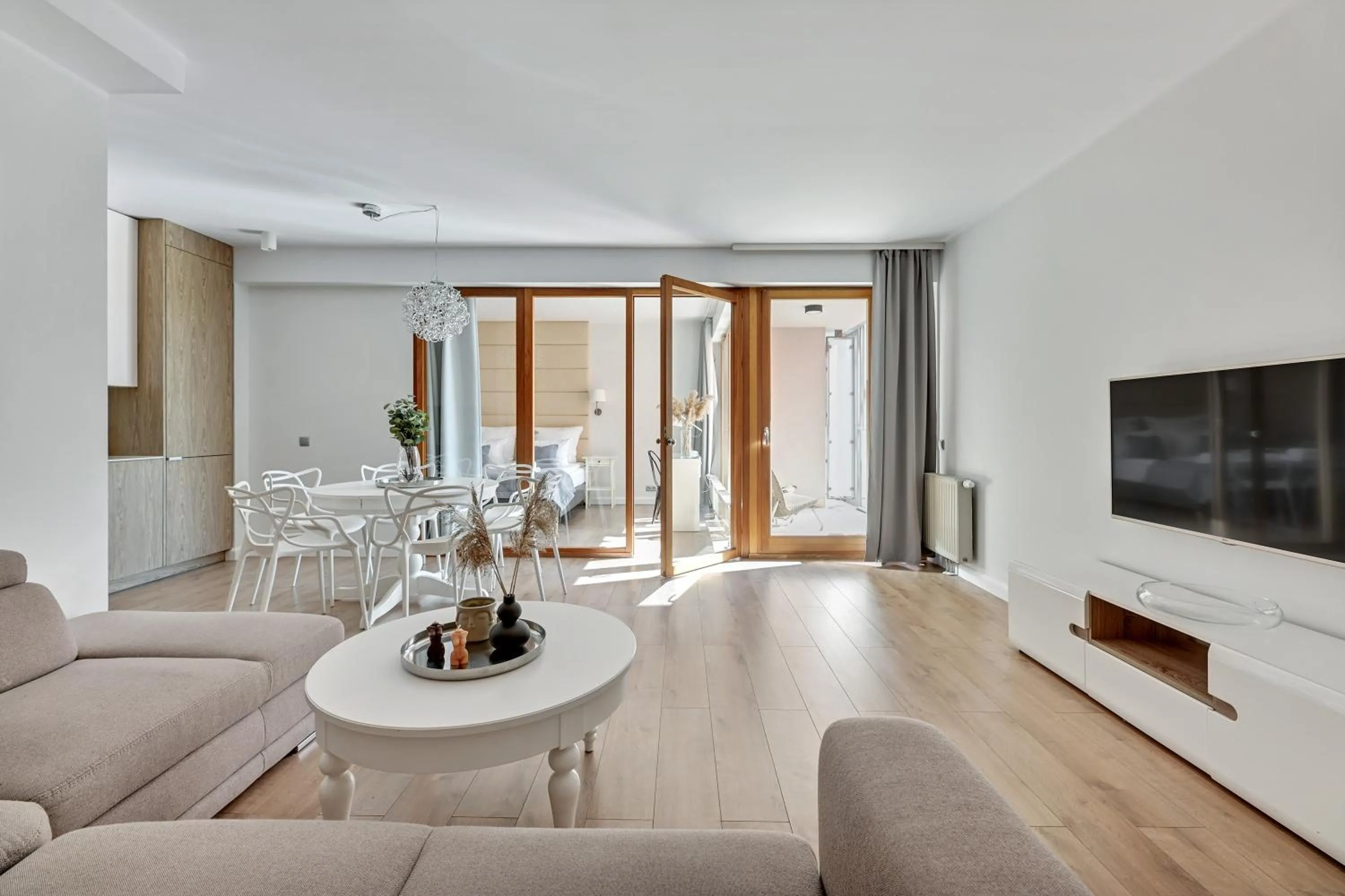 Communal lounge/ TV room in Aura - Riverside & Parking by Downtown Apartments