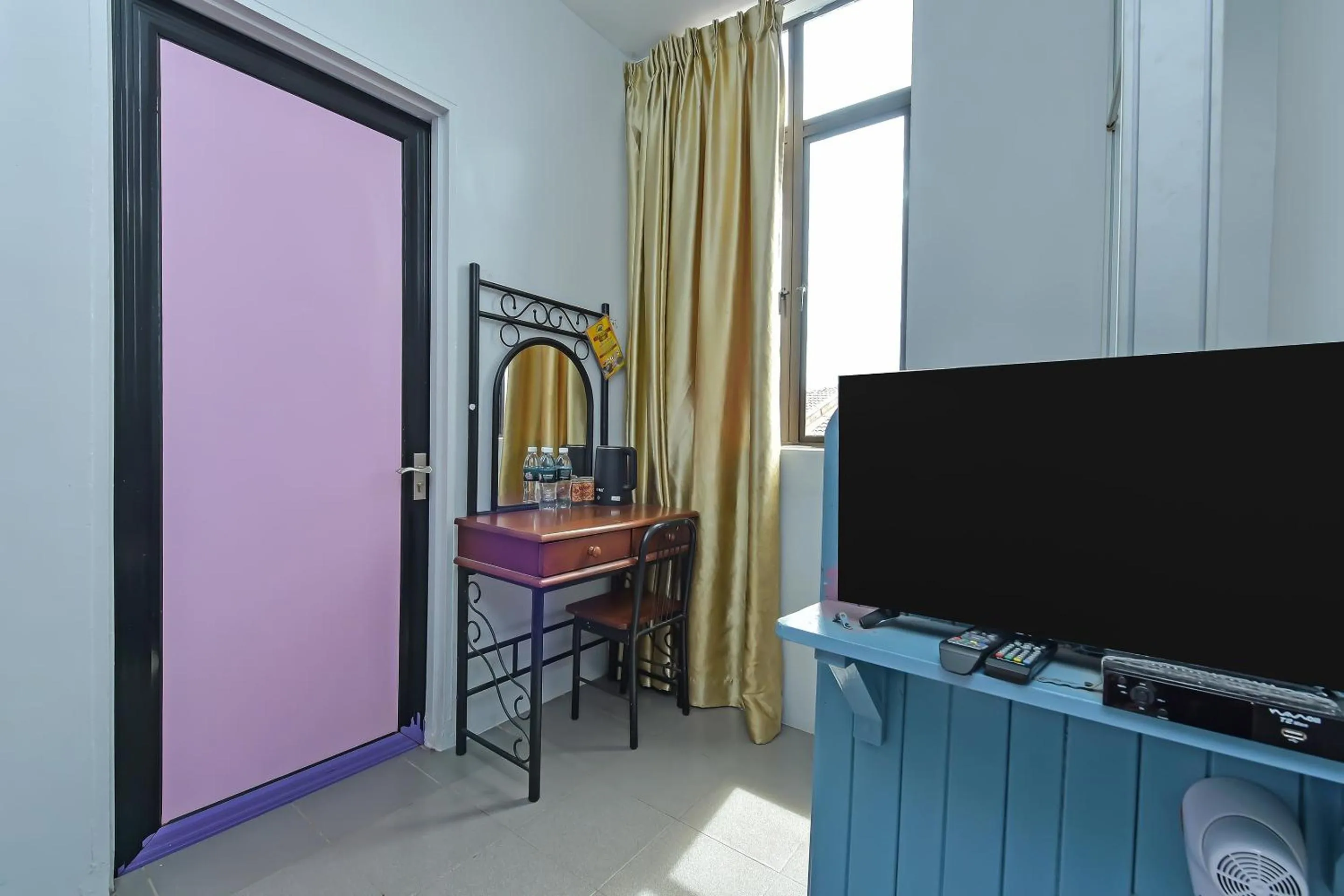 Bedroom in Hotel O Purple Town