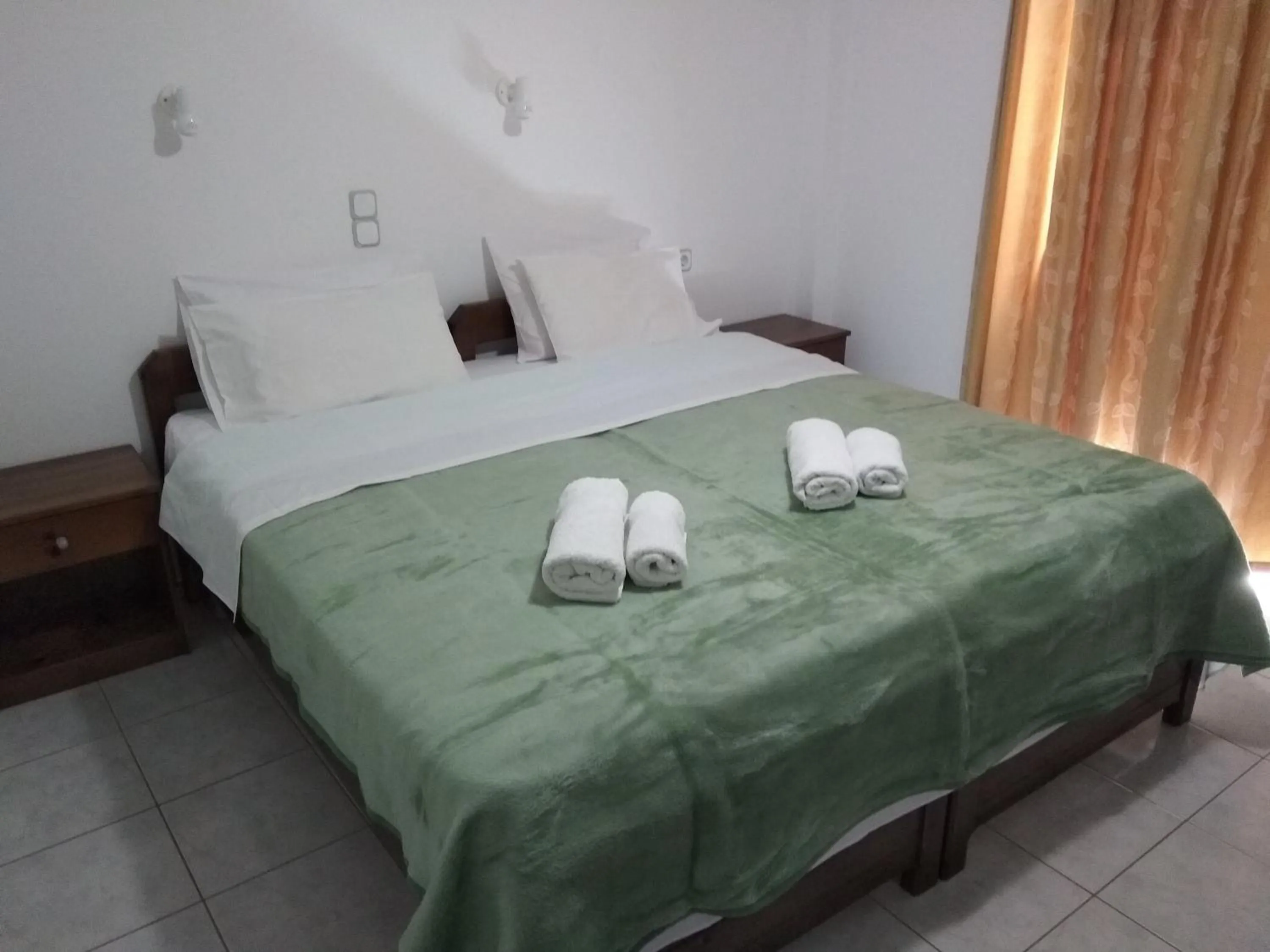 Bed in Litsa Mare Apartments