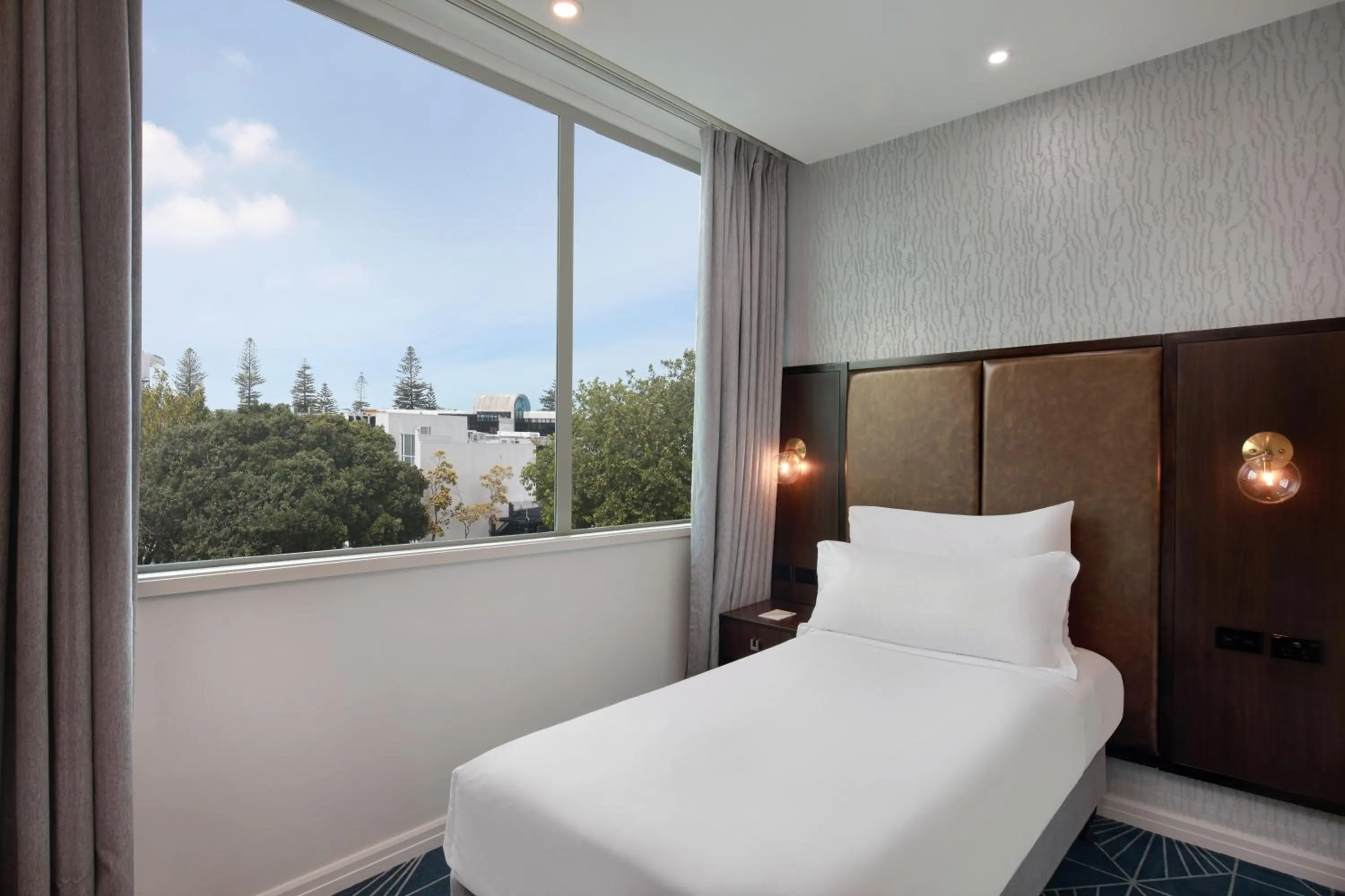 Bed in Swiss-Belhotel Napier