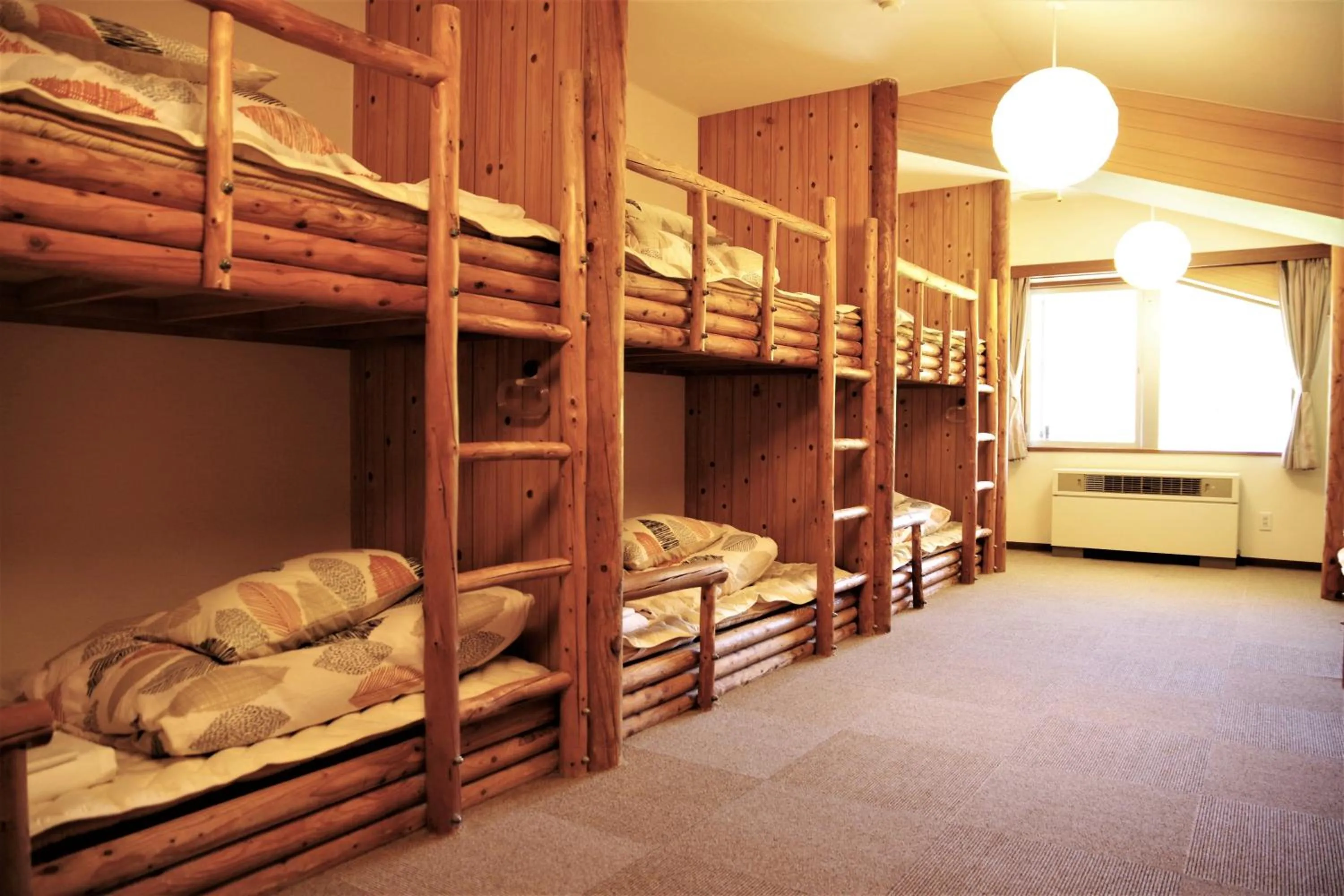 Photo of the whole room, Bed in K's House Hokkaido - Asahidake Onsen Hostel