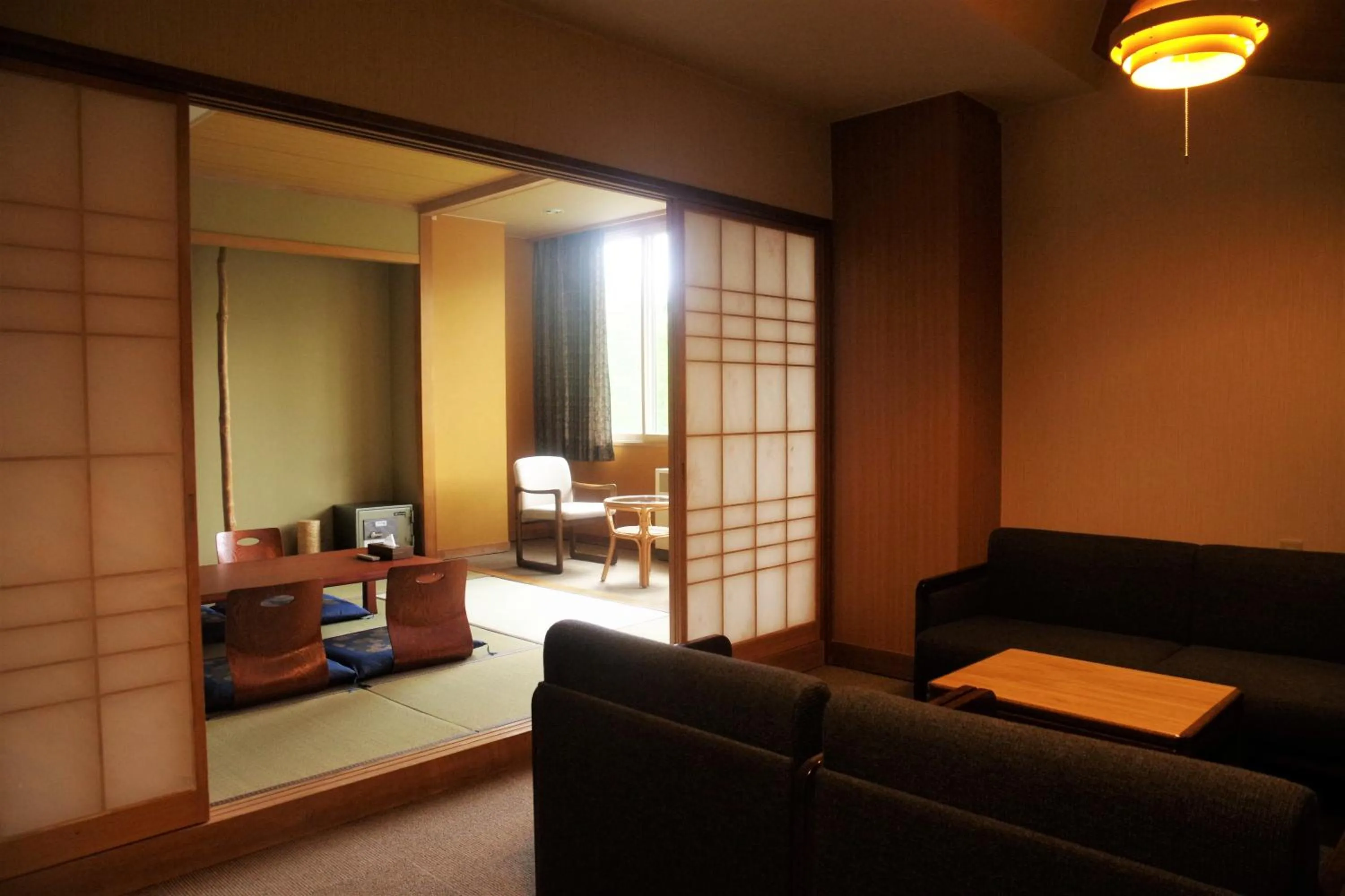 Seating area in K's House Hokkaido - Asahidake Onsen Hostel