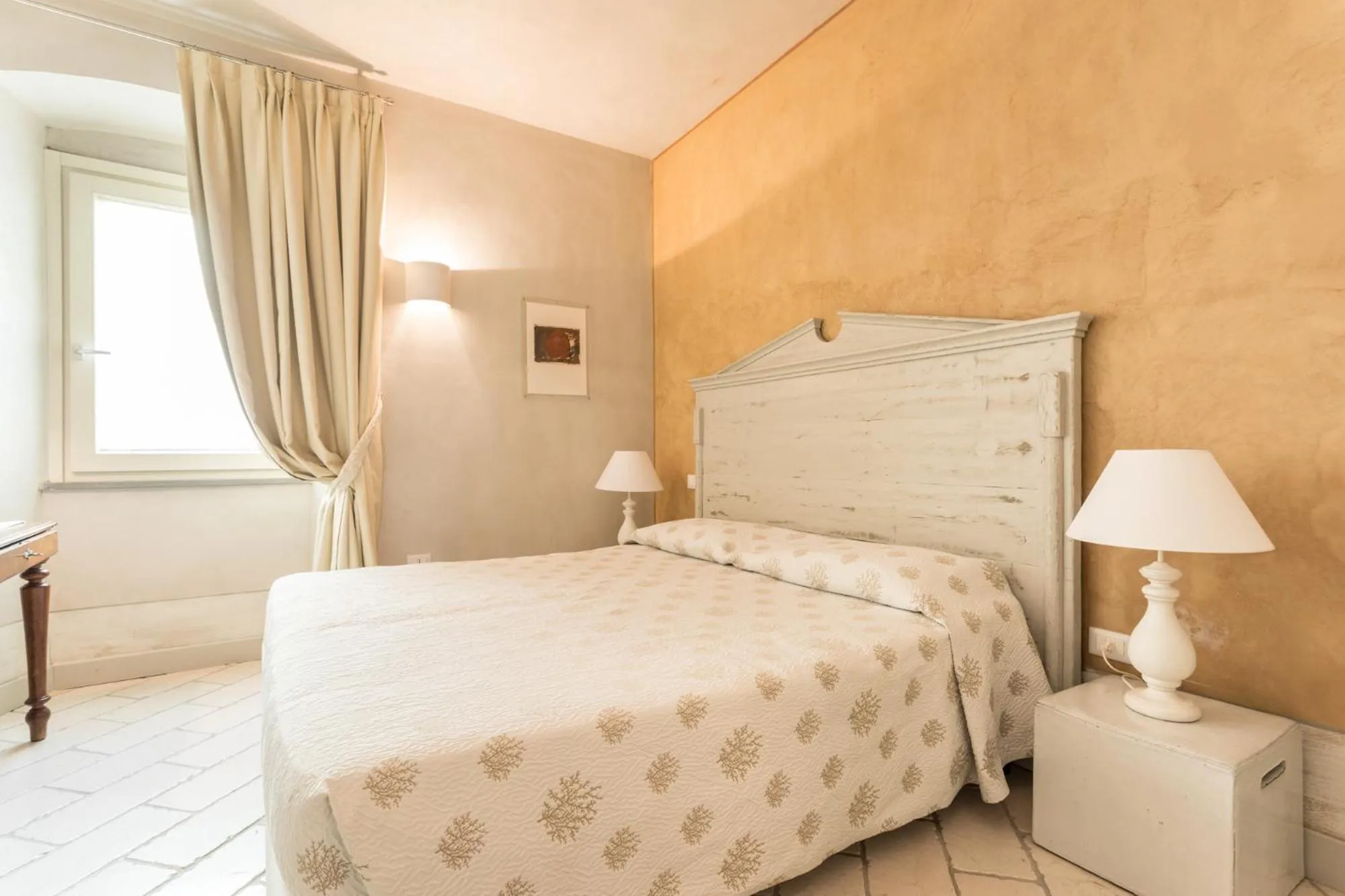 Photo of the whole room, Bed in Il Cortiletto Hotel Maison