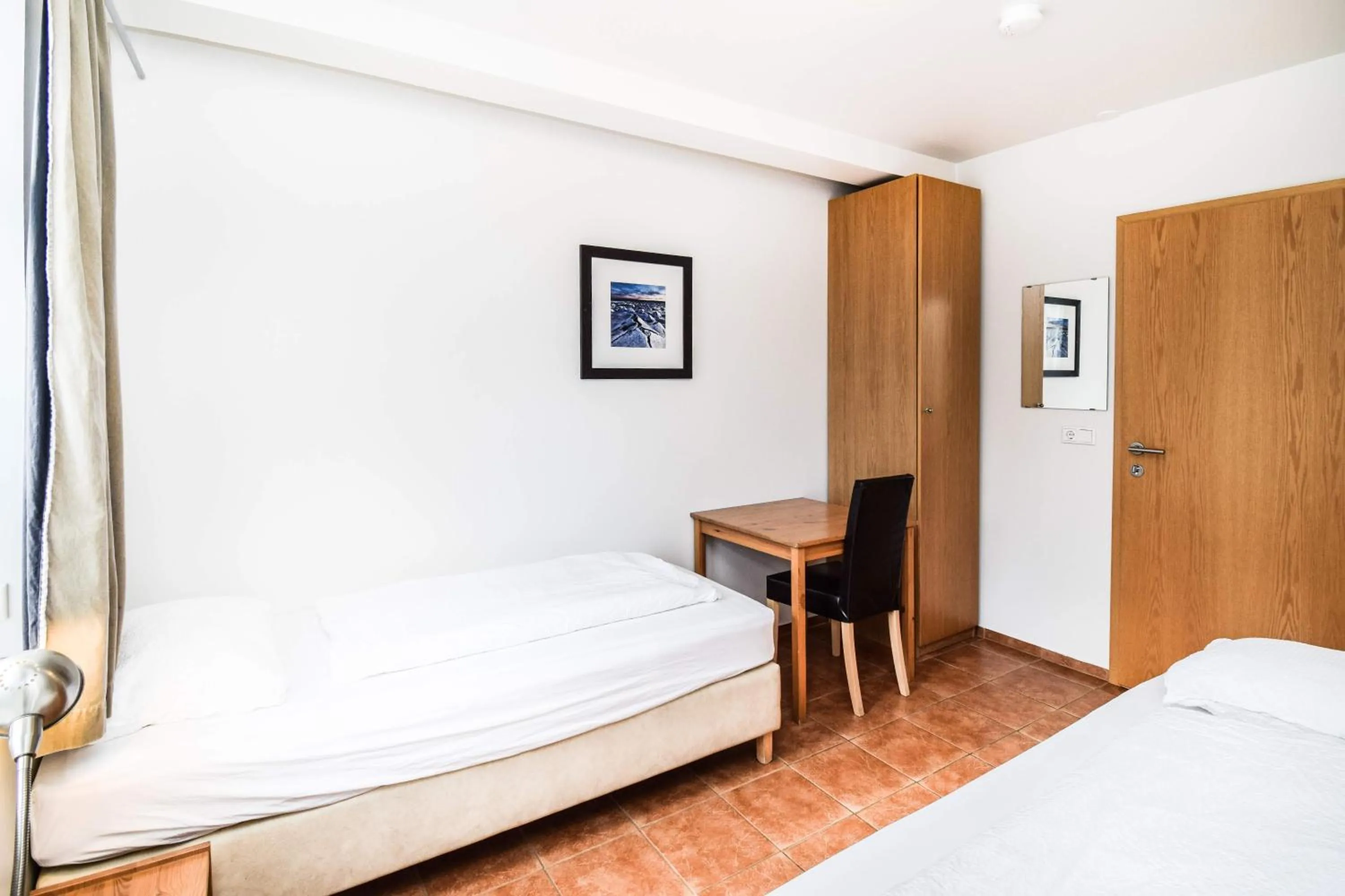 Bed in Guesthouse Aurora