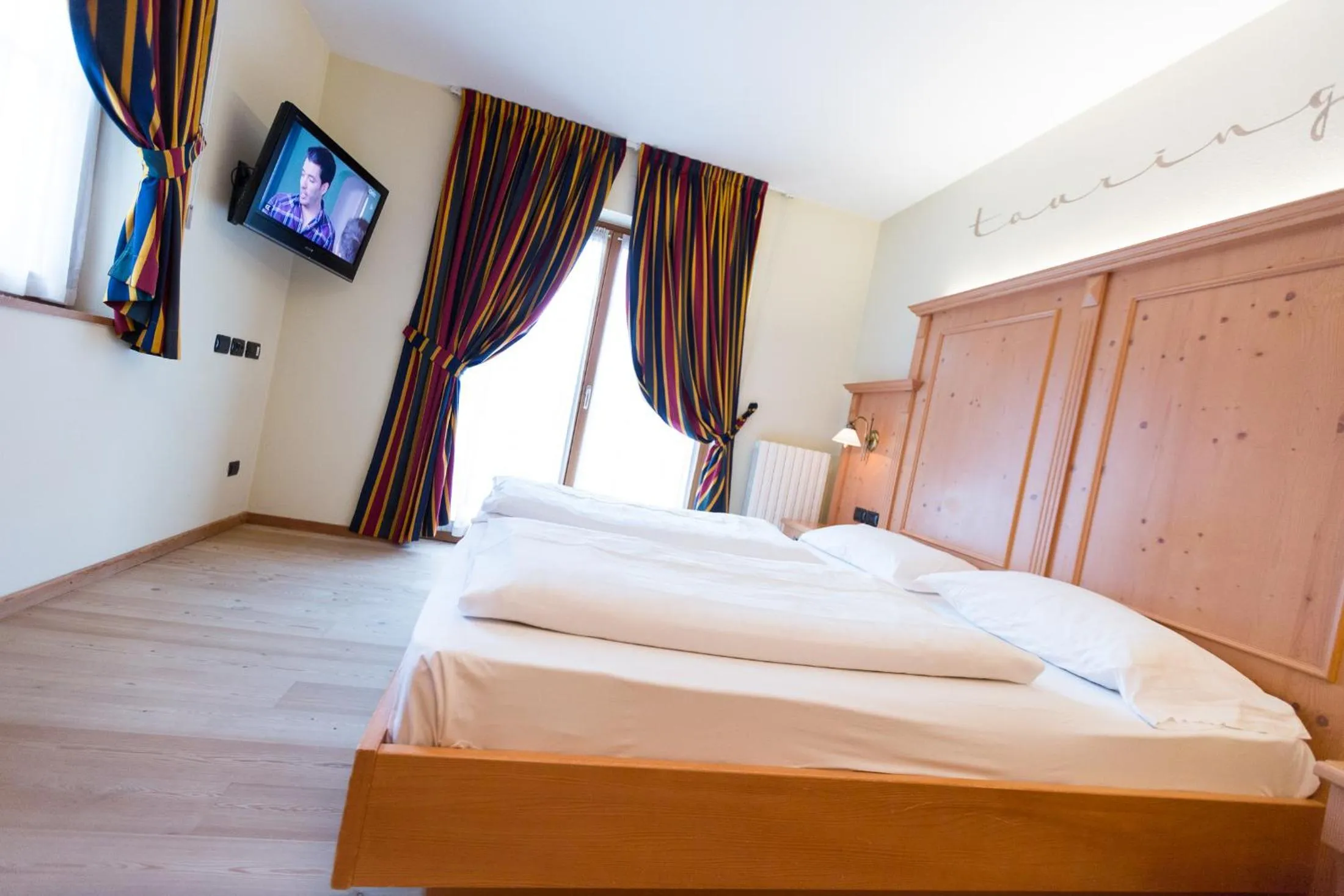 Bed in Hotel Touring