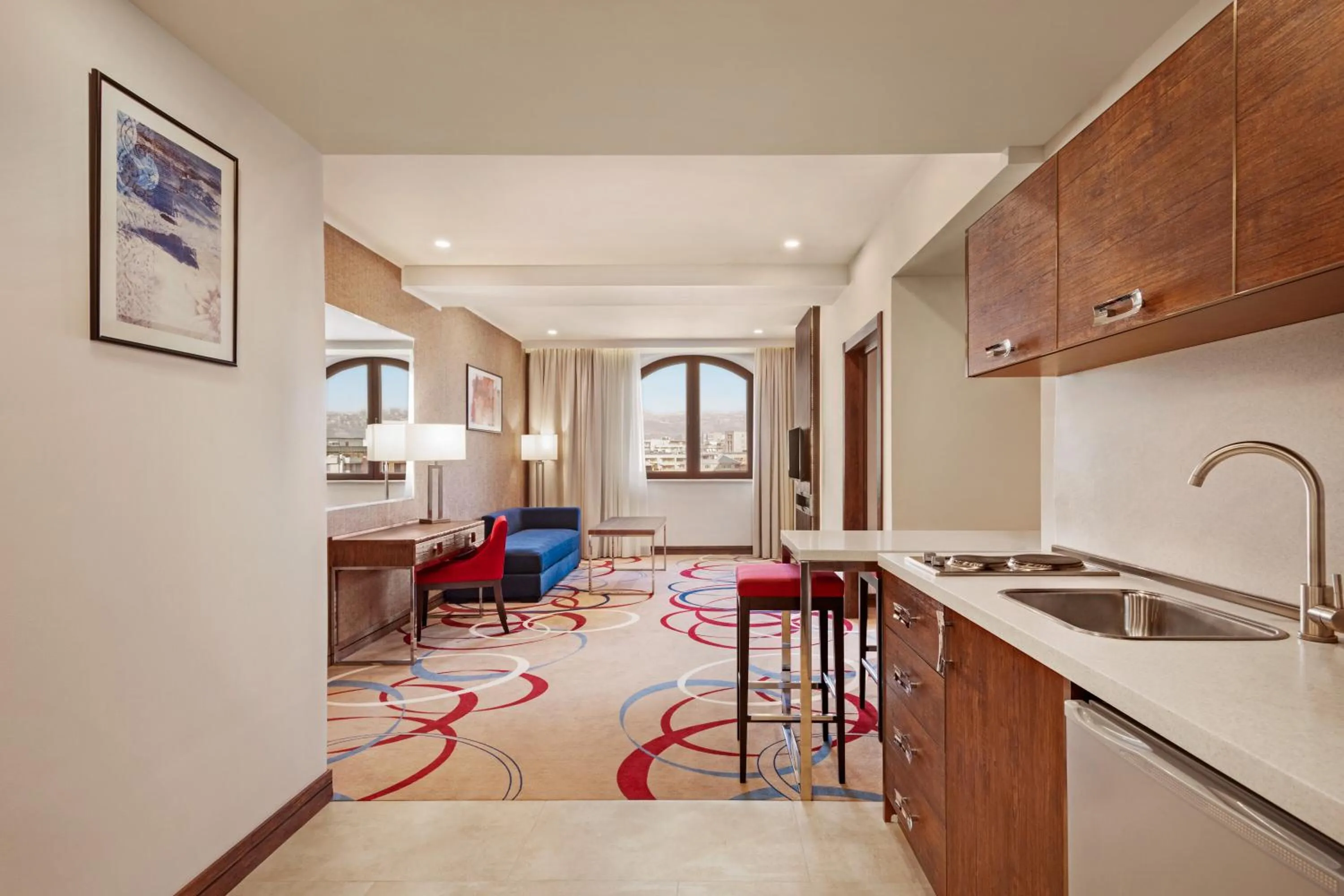 Kitchen or kitchenette in Ramada Hotel & Suites by Wyndham Yerevan