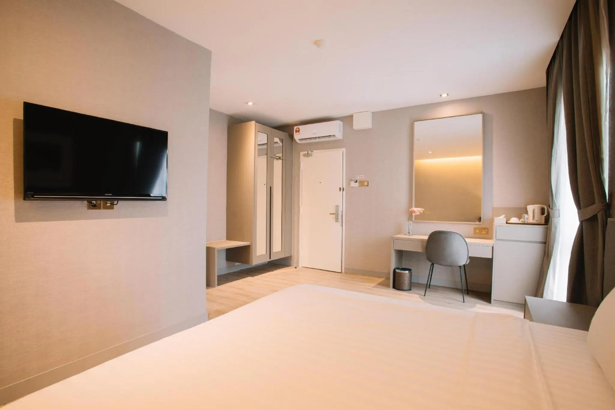 Bed in De Cyber Boutique Hotel