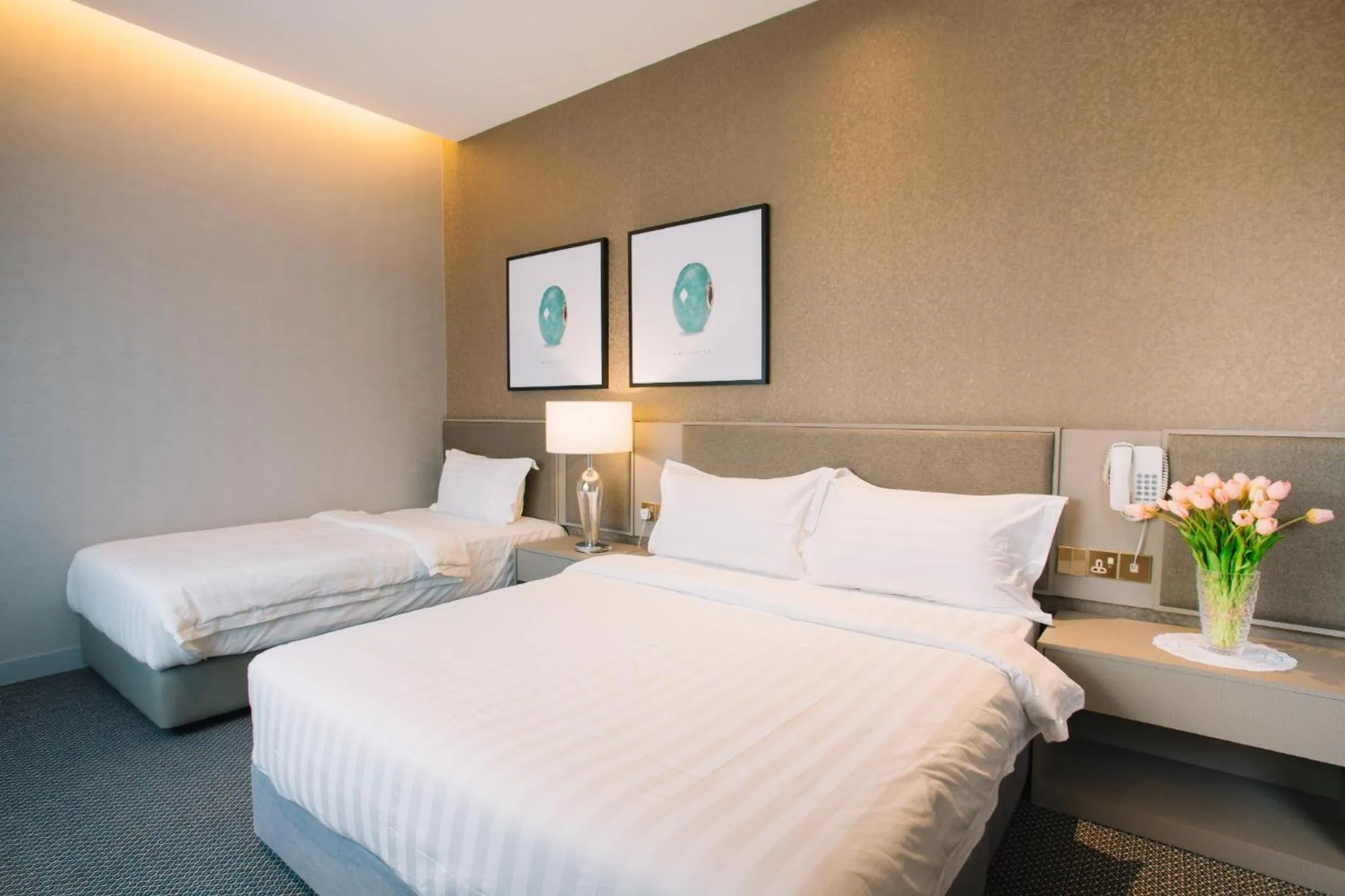 Bed in De Cyber Boutique Hotel