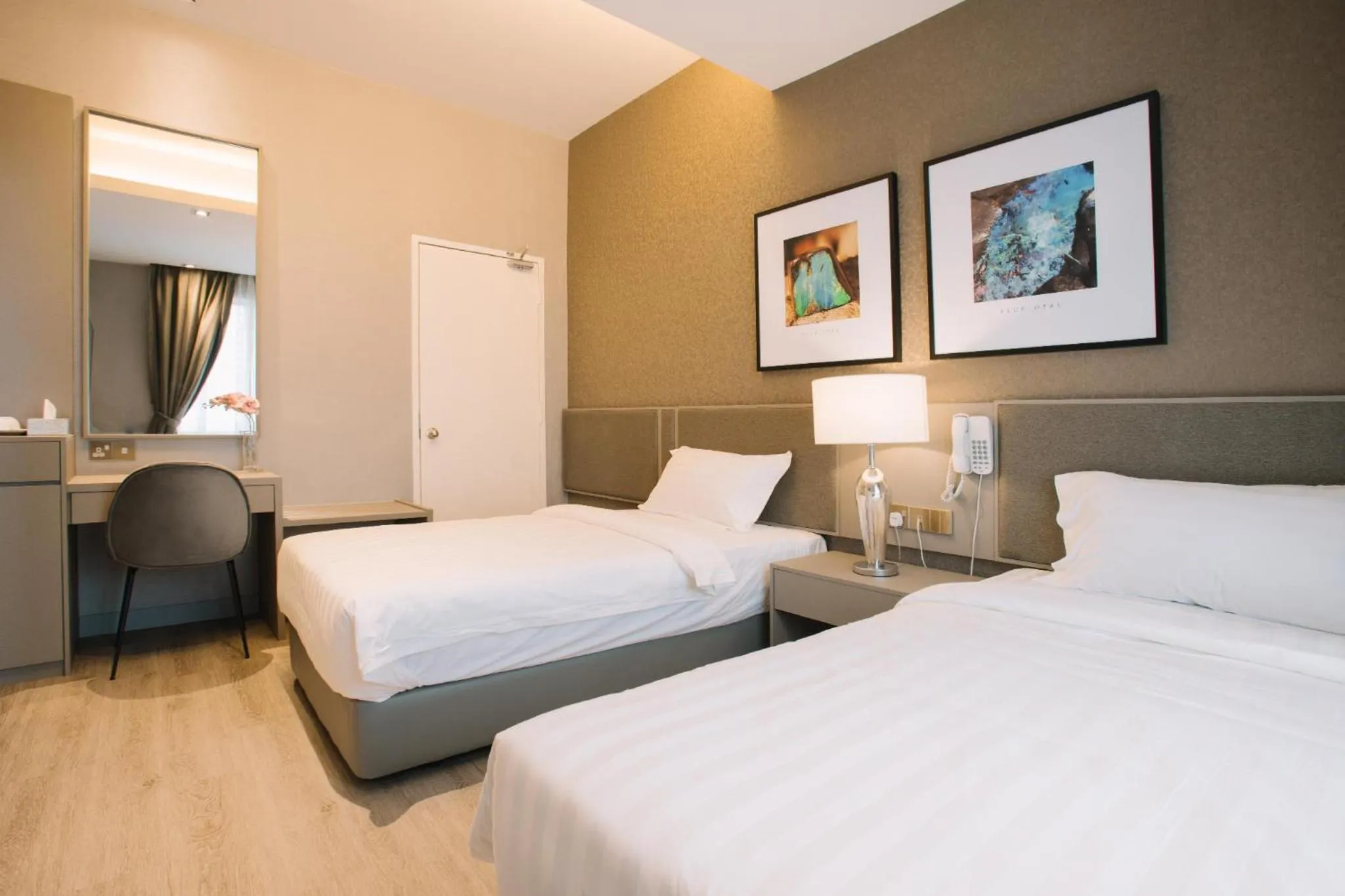 Bed in De Cyber Boutique Hotel