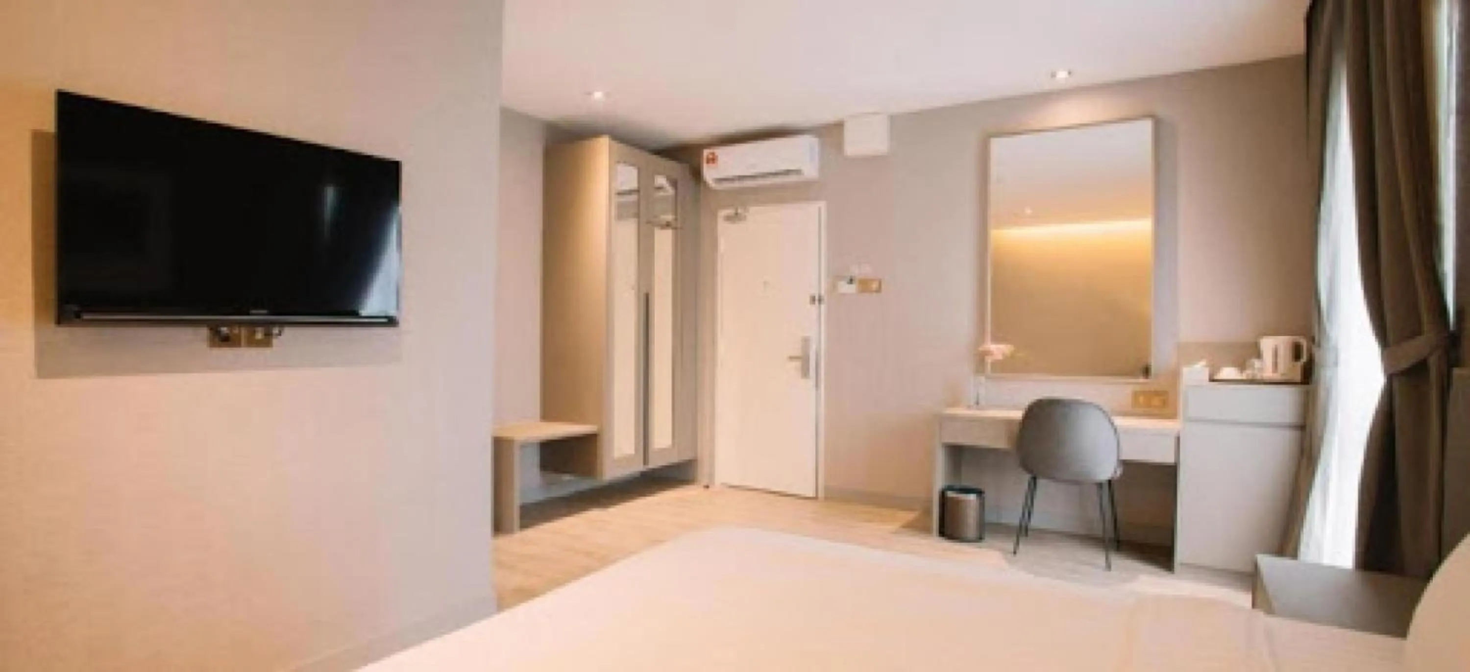 Bed in De Cyber Boutique Hotel