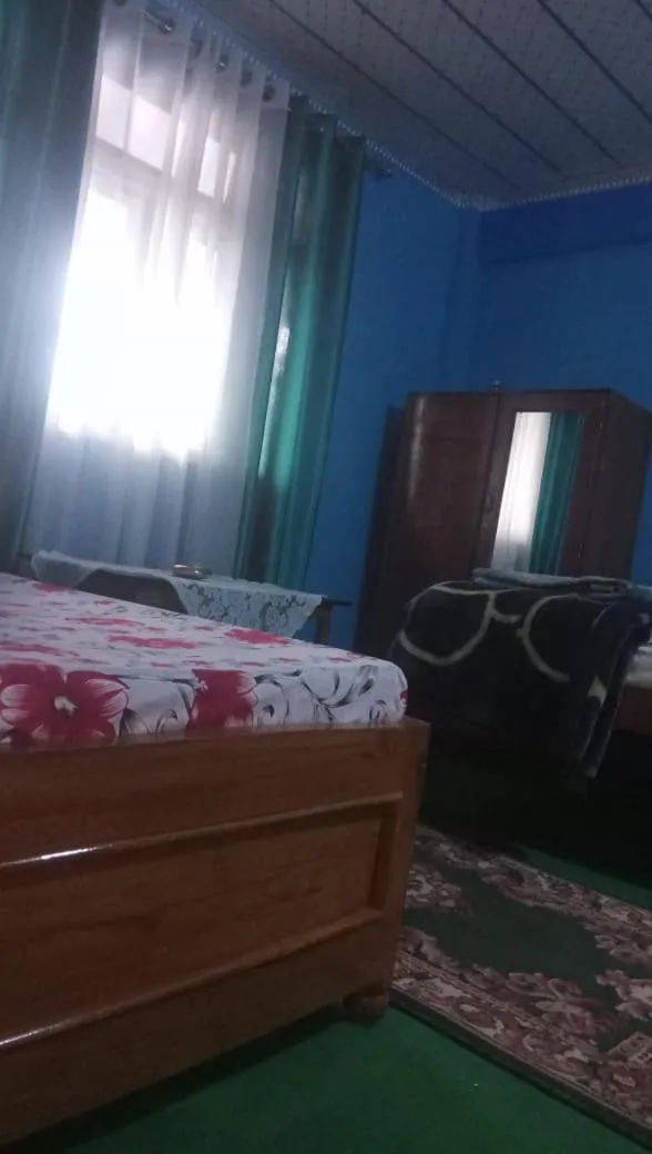 Bed in Sanjeema Tea Estate Homestay