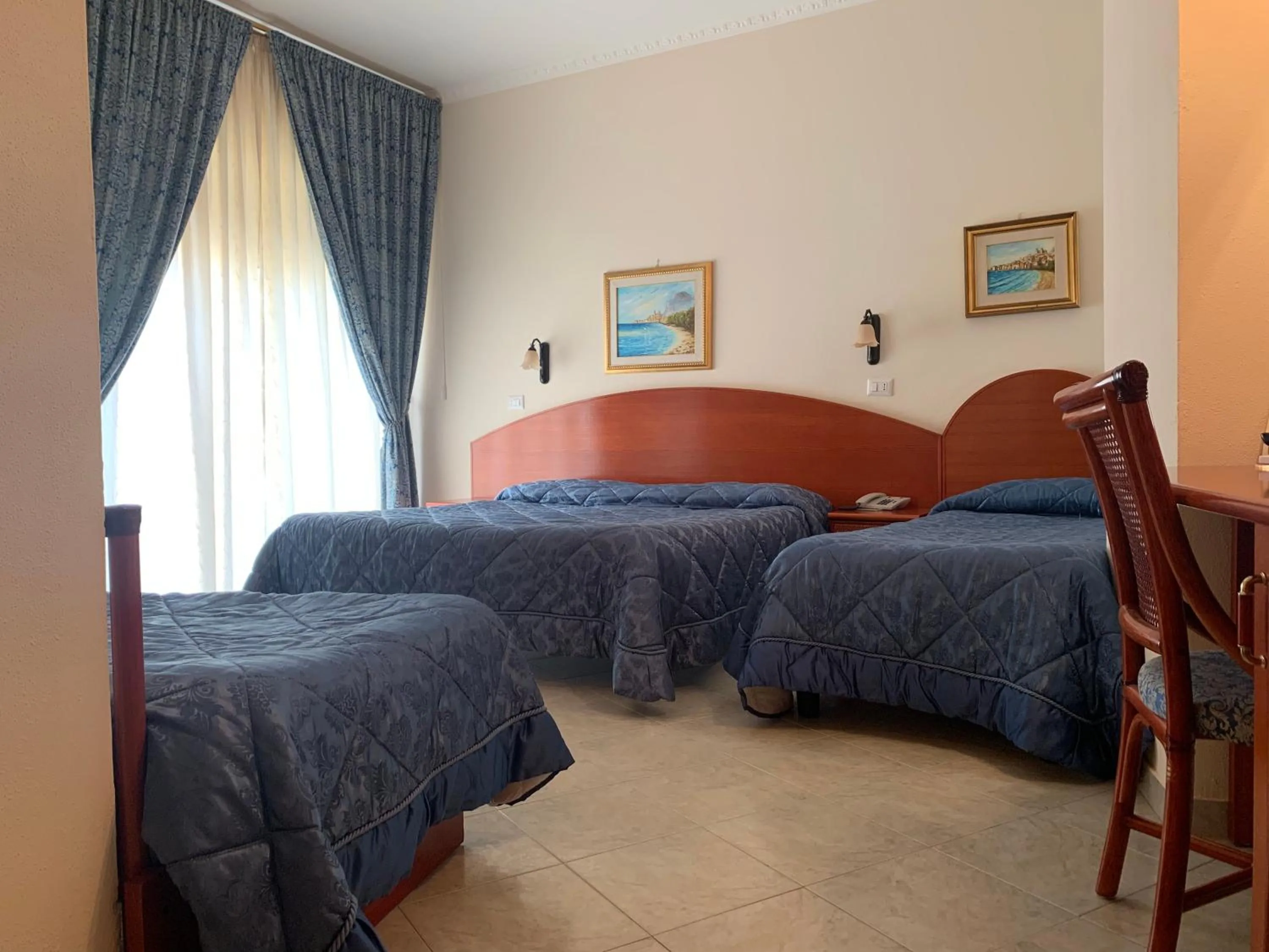 Bed in Hotel Mediterraneo