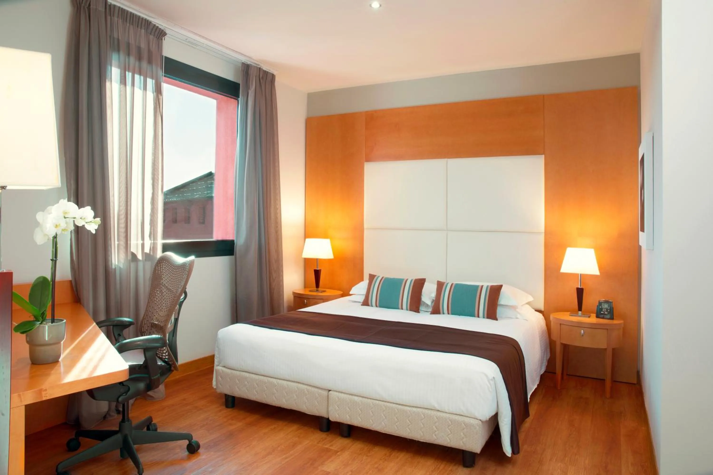 Bed in Zeus Essence Dolce by Wyndham Milan Malpensa