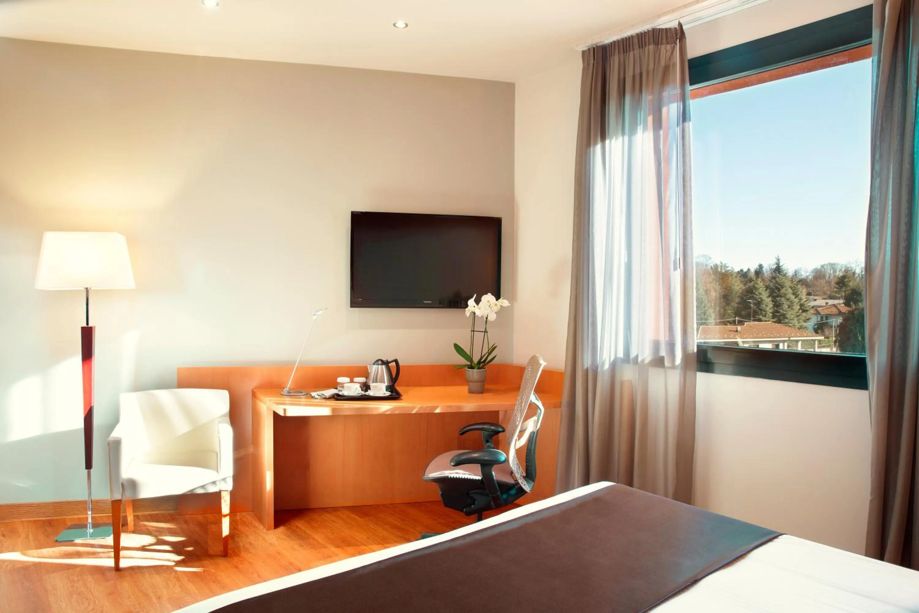 Bed in Zeus Essence Dolce by Wyndham Milan Malpensa