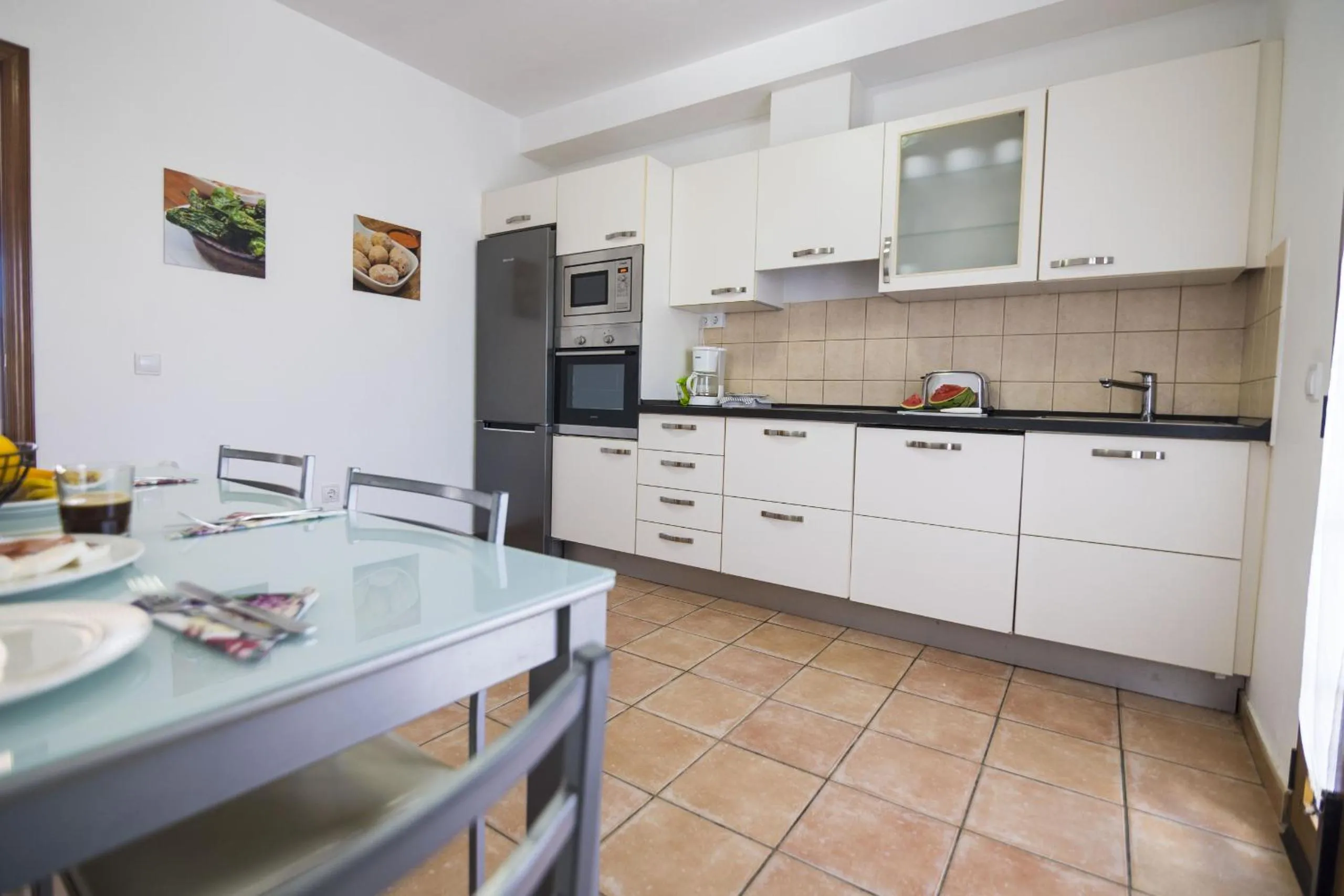 Kitchen or kitchenette in Villas & Apartamentos Tao Mazo