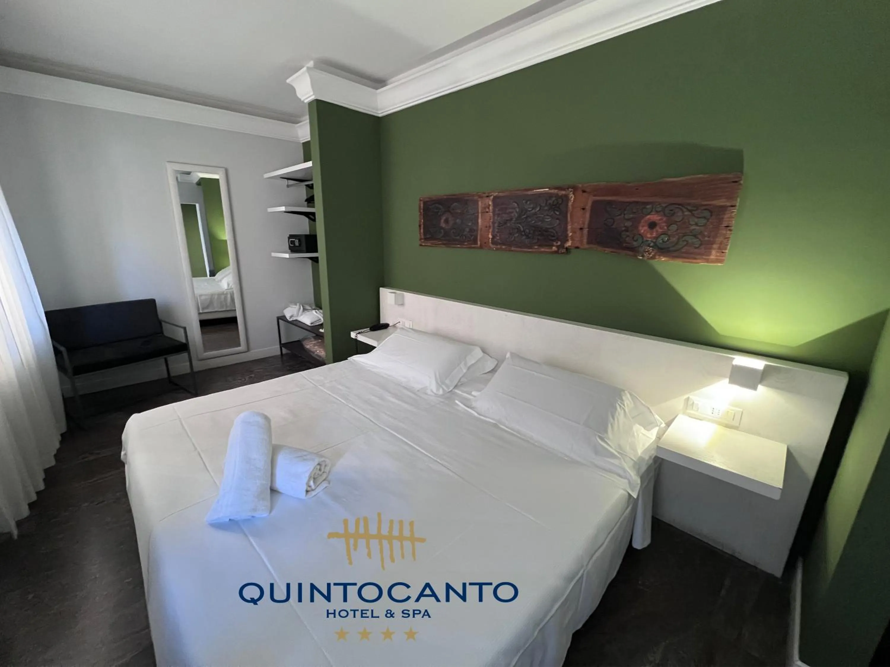 Bed in Quintocanto Hotel & Spa