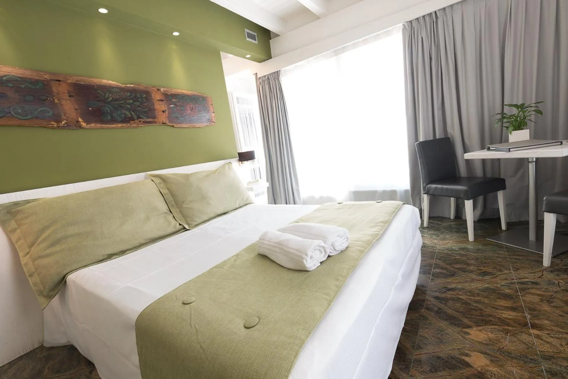 Bed in Quintocanto Hotel & Spa