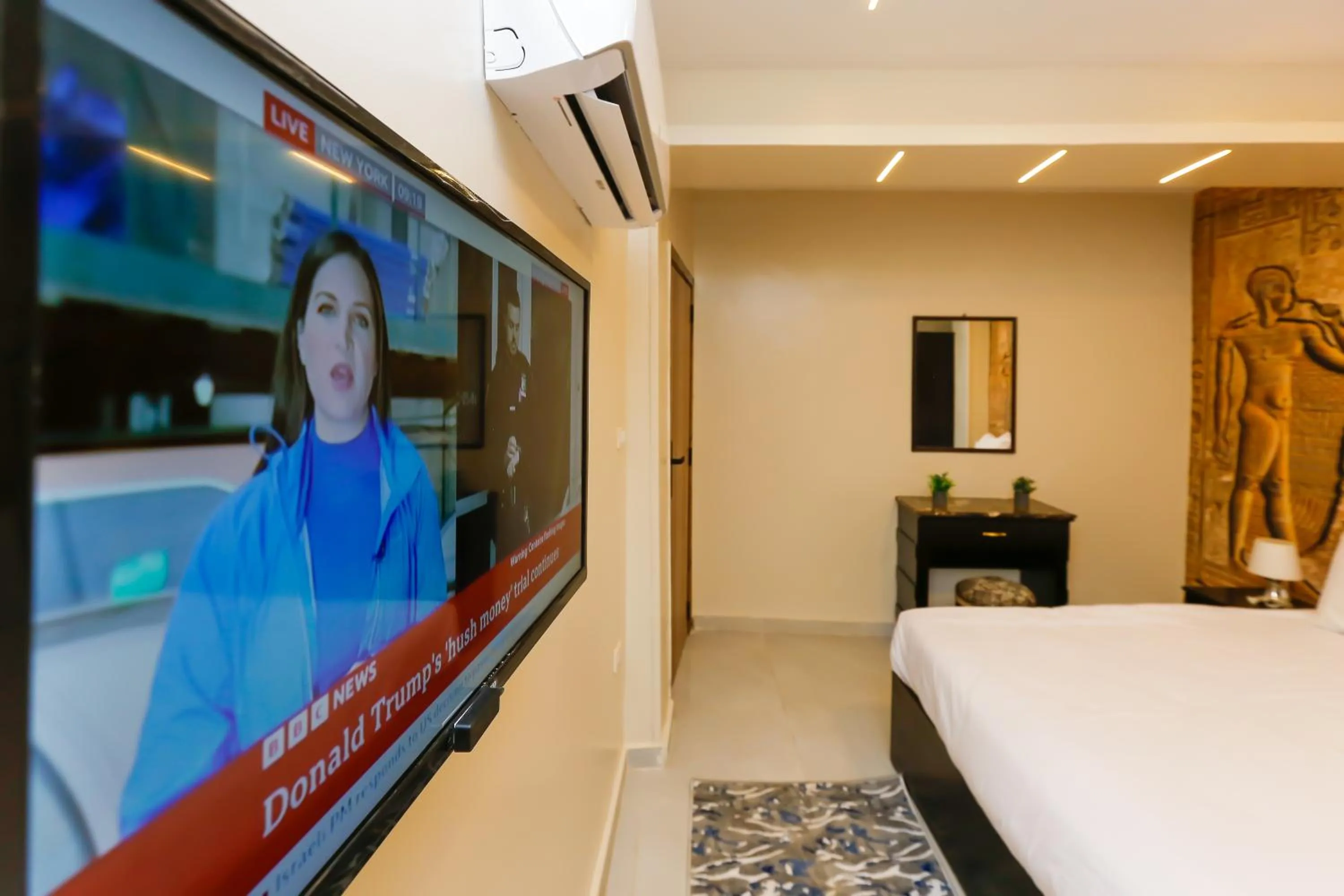 Communal lounge/ TV room, Bed in Giza Pyramids View Inn