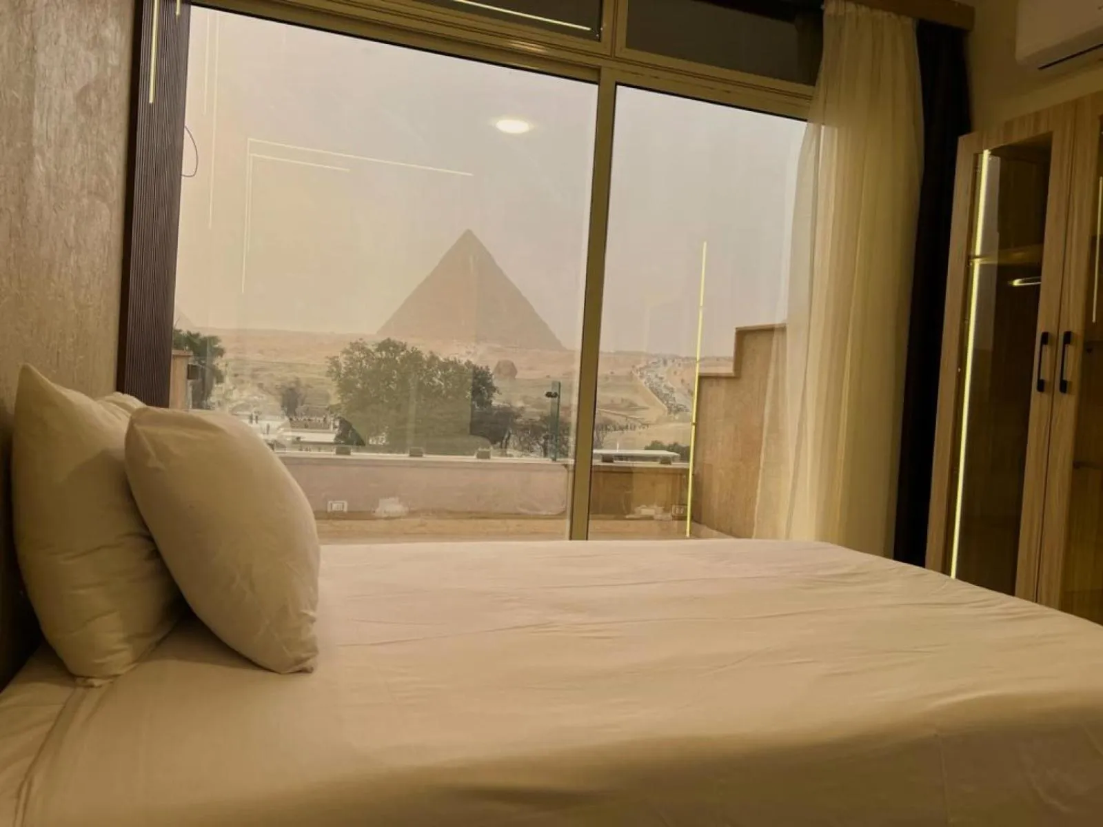View (from property/room), Bed in Giza Pyramids View Inn
