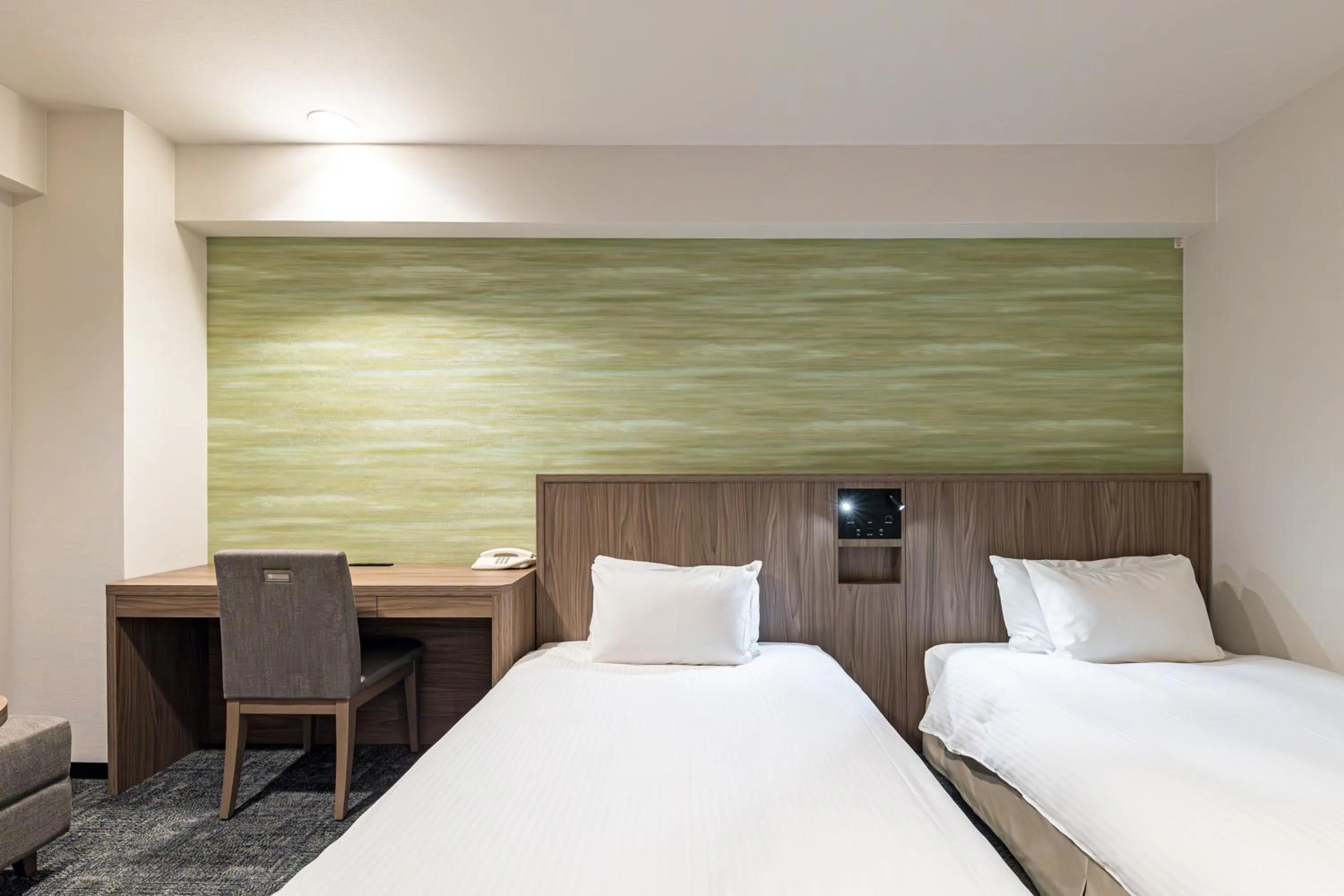 Bed in Hotel JAL City Nagano