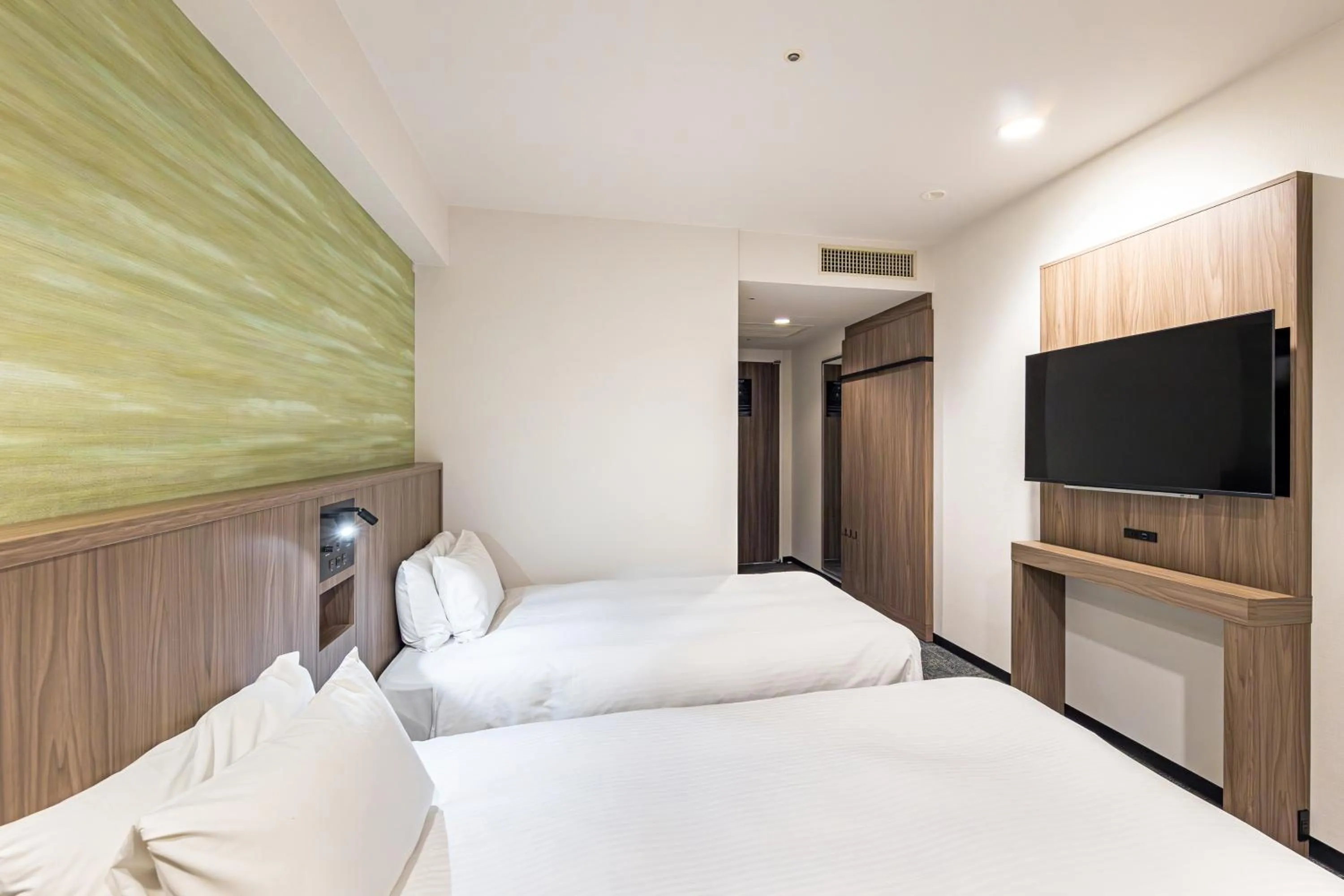 Bed in Hotel JAL City Nagano