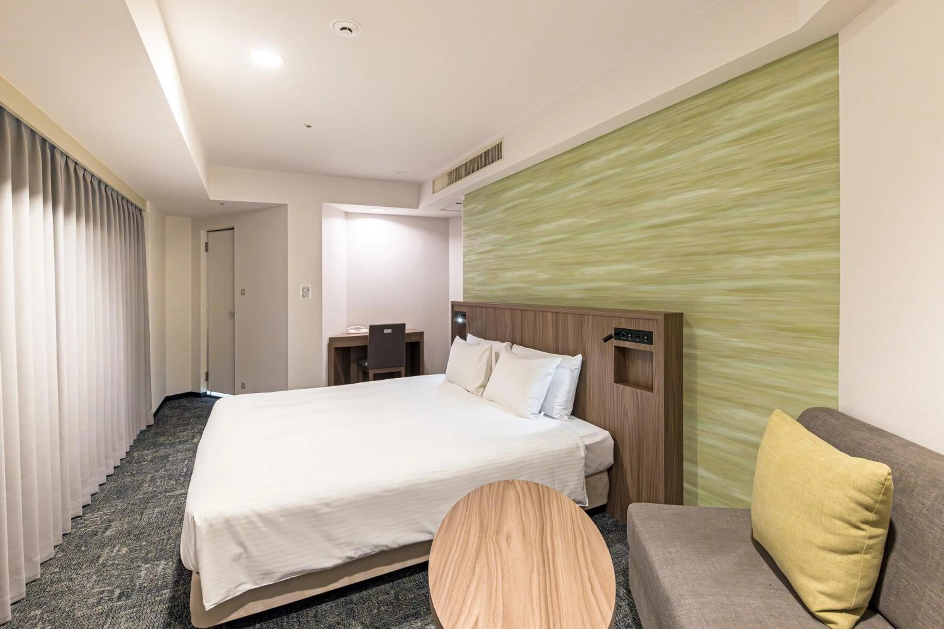 Bed in Hotel JAL City Nagano