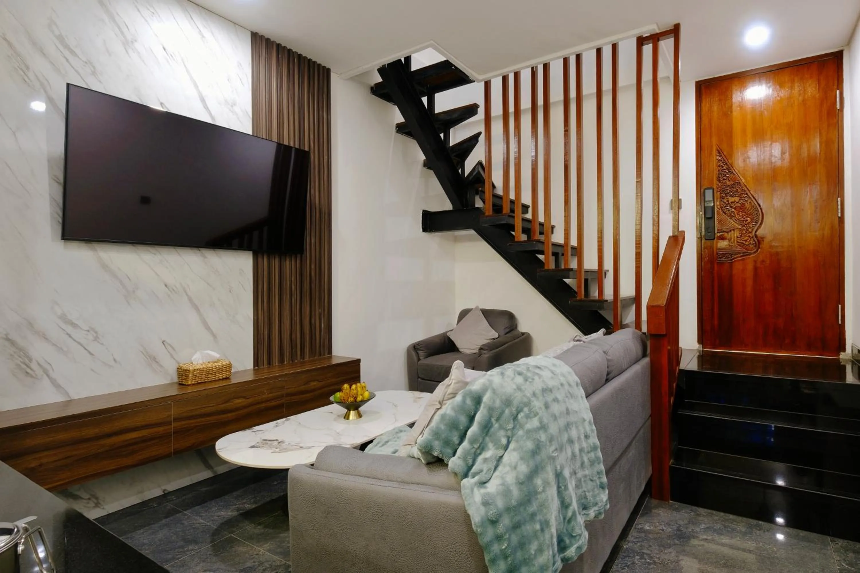 Communal lounge/ TV room in Utamas Keramas Villa