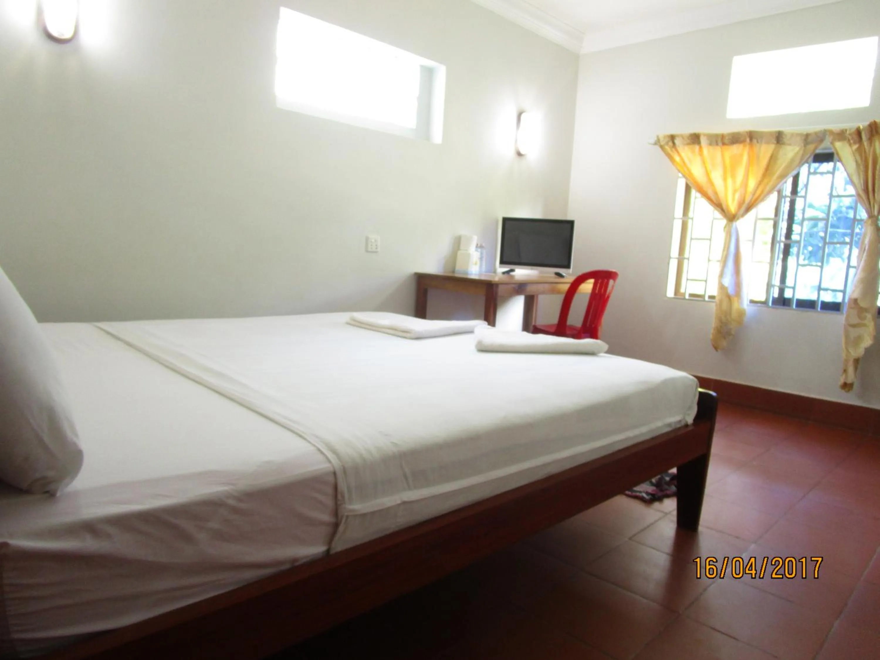 Bed in Visal Sak Guesthouse