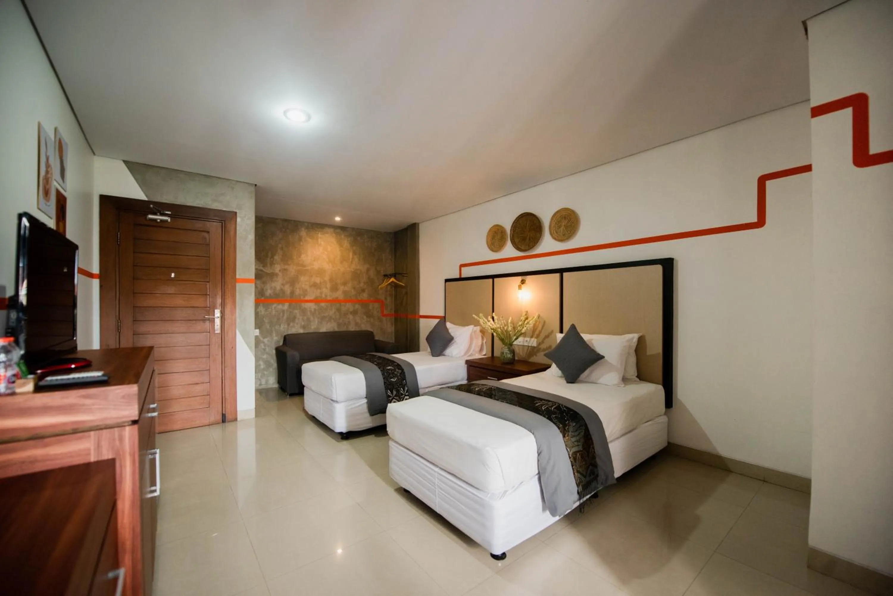 Bed in Sandat Hotel Legian