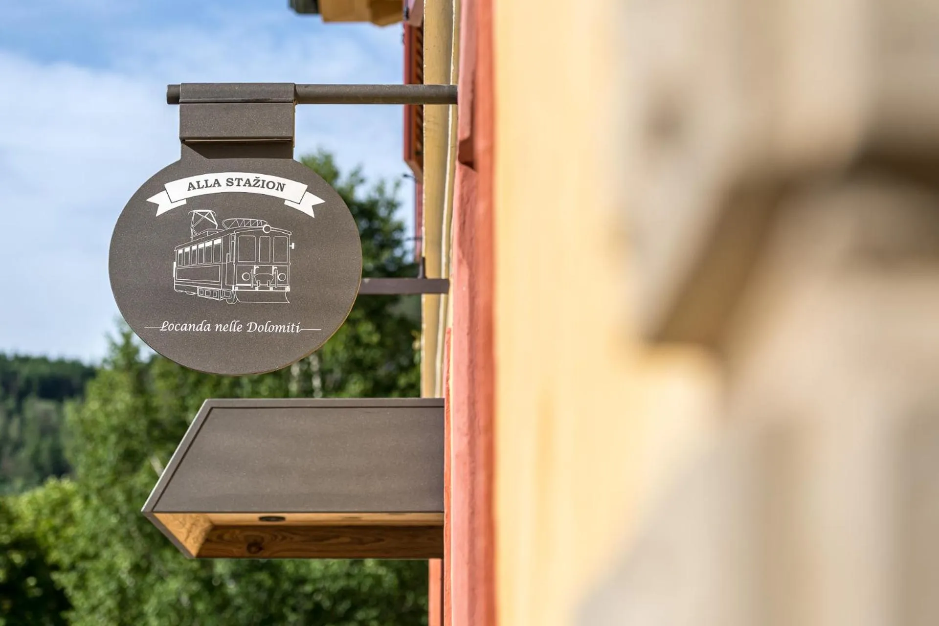 Property logo or sign in Alla Stazion Locanda nelle Dolomiti