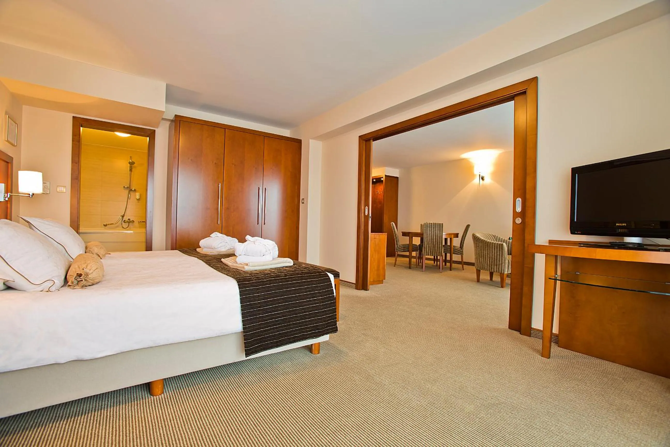 Bed in Spa & Wellness Hotel Pinia
