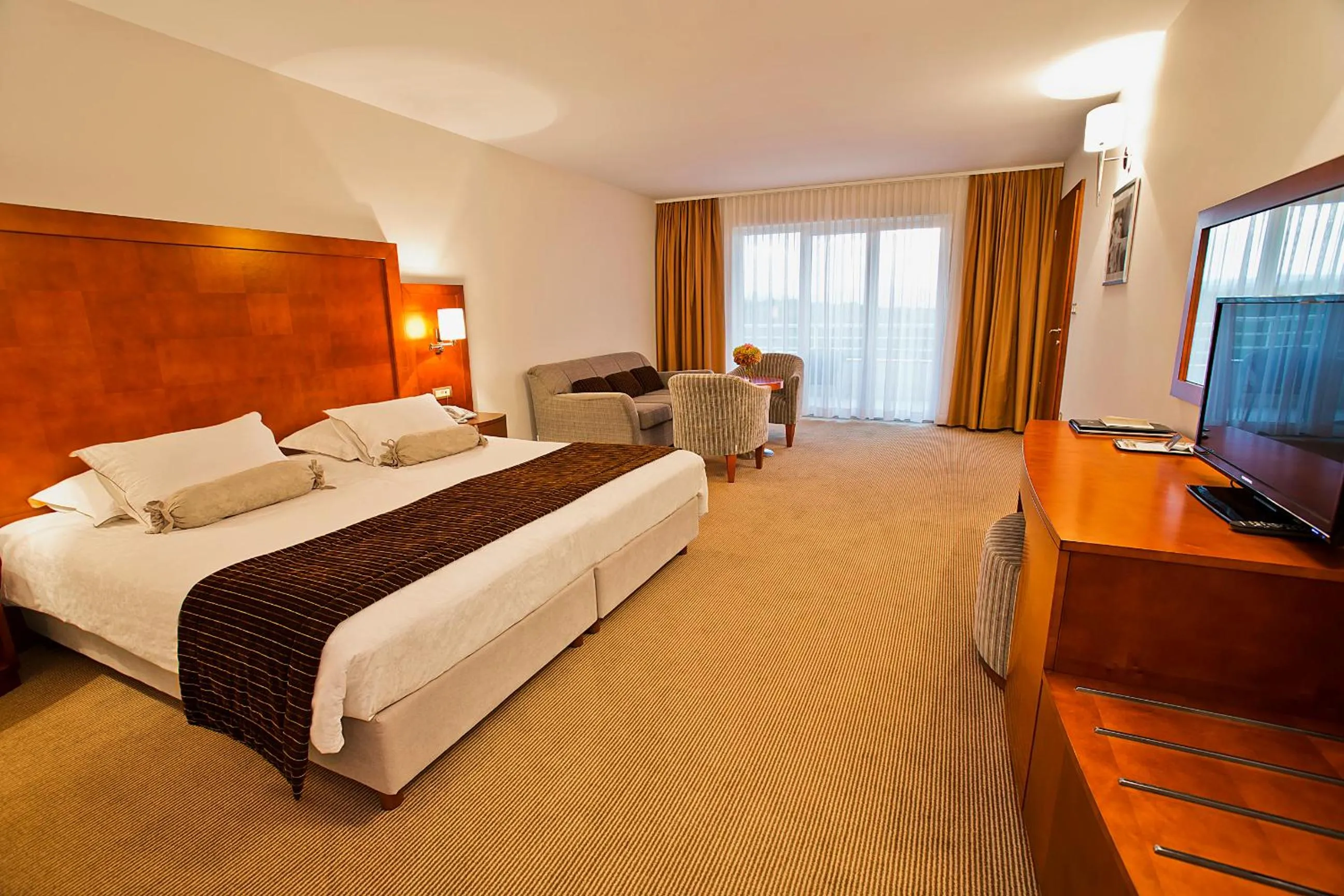 Bed in Spa & Wellness Hotel Pinia