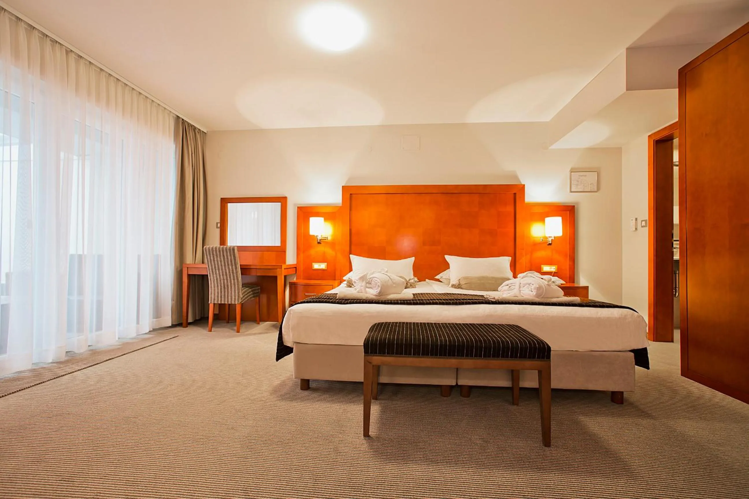 Bed in Spa & Wellness Hotel Pinia