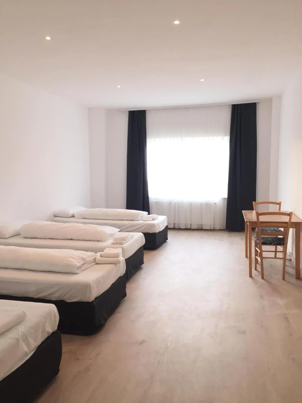 Photo of the whole room, Bed in Pension Dreilinden Hannover GmbH
