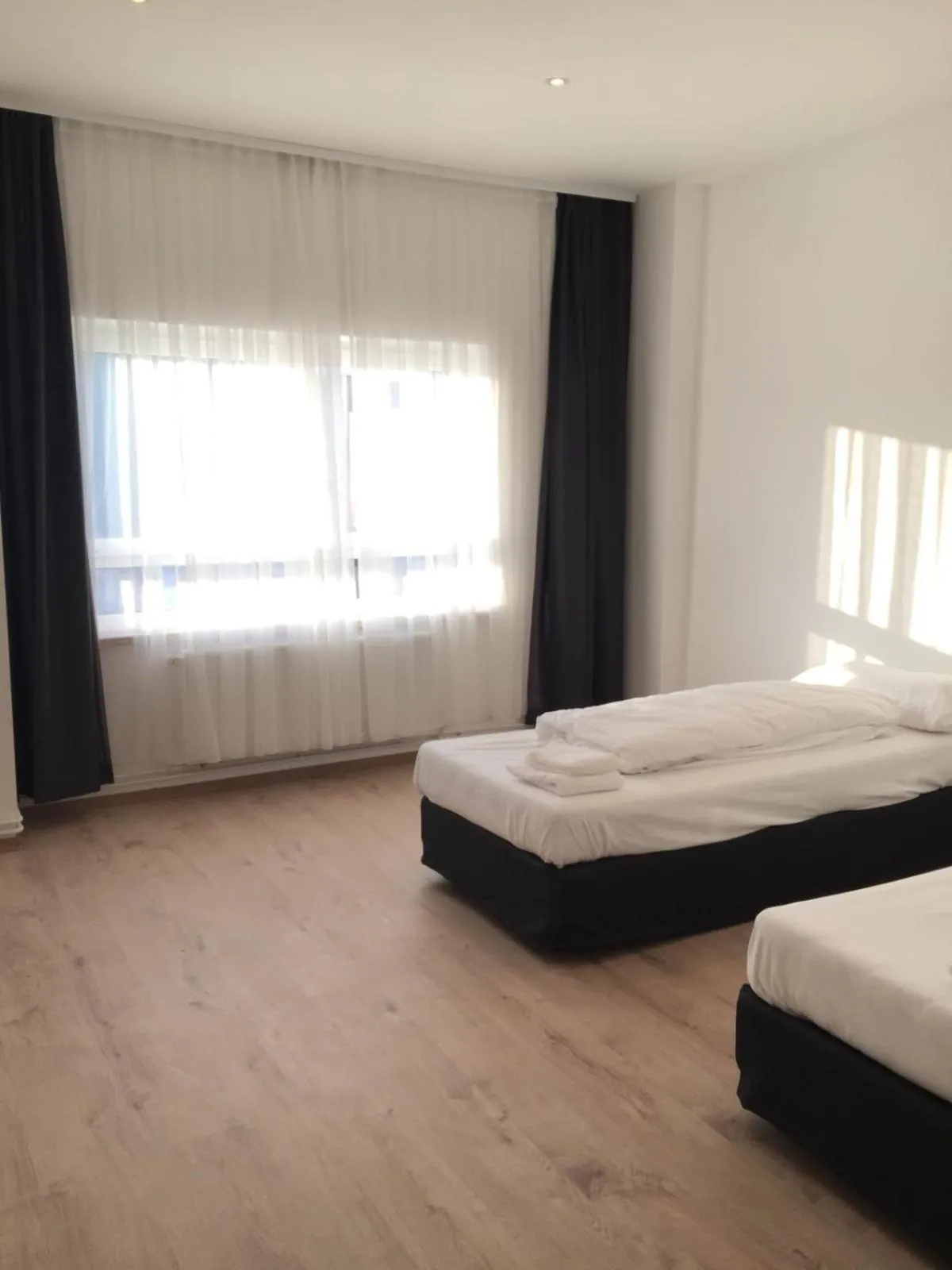 Photo of the whole room, Bed in Pension Dreilinden Hannover GmbH