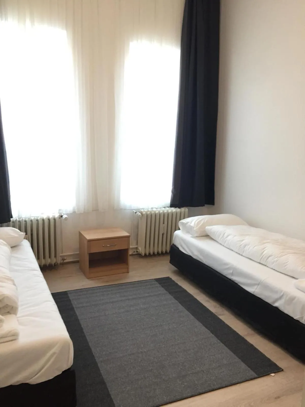 Photo of the whole room, Bed in Pension Dreilinden Hannover GmbH