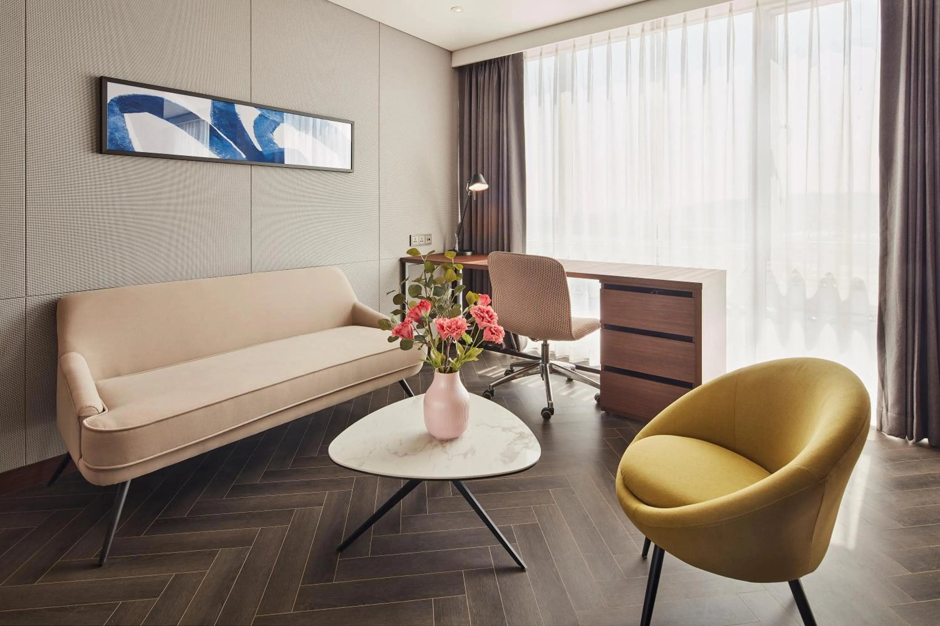 Living room in Ramada Encore by Wyndham Gimpo Han River Hotel