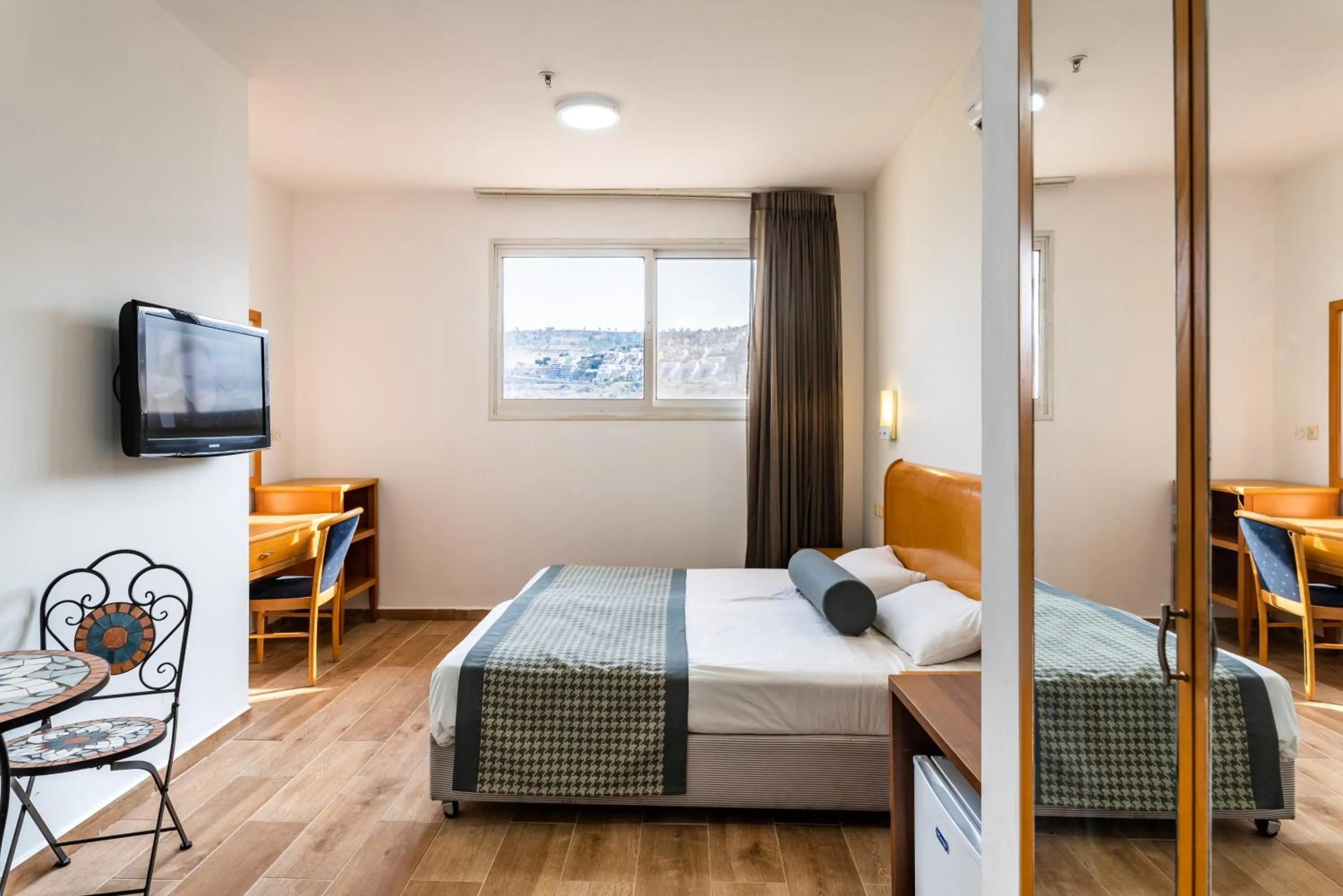 Photo of the whole room, Bed in Astoria Galilee Hotel