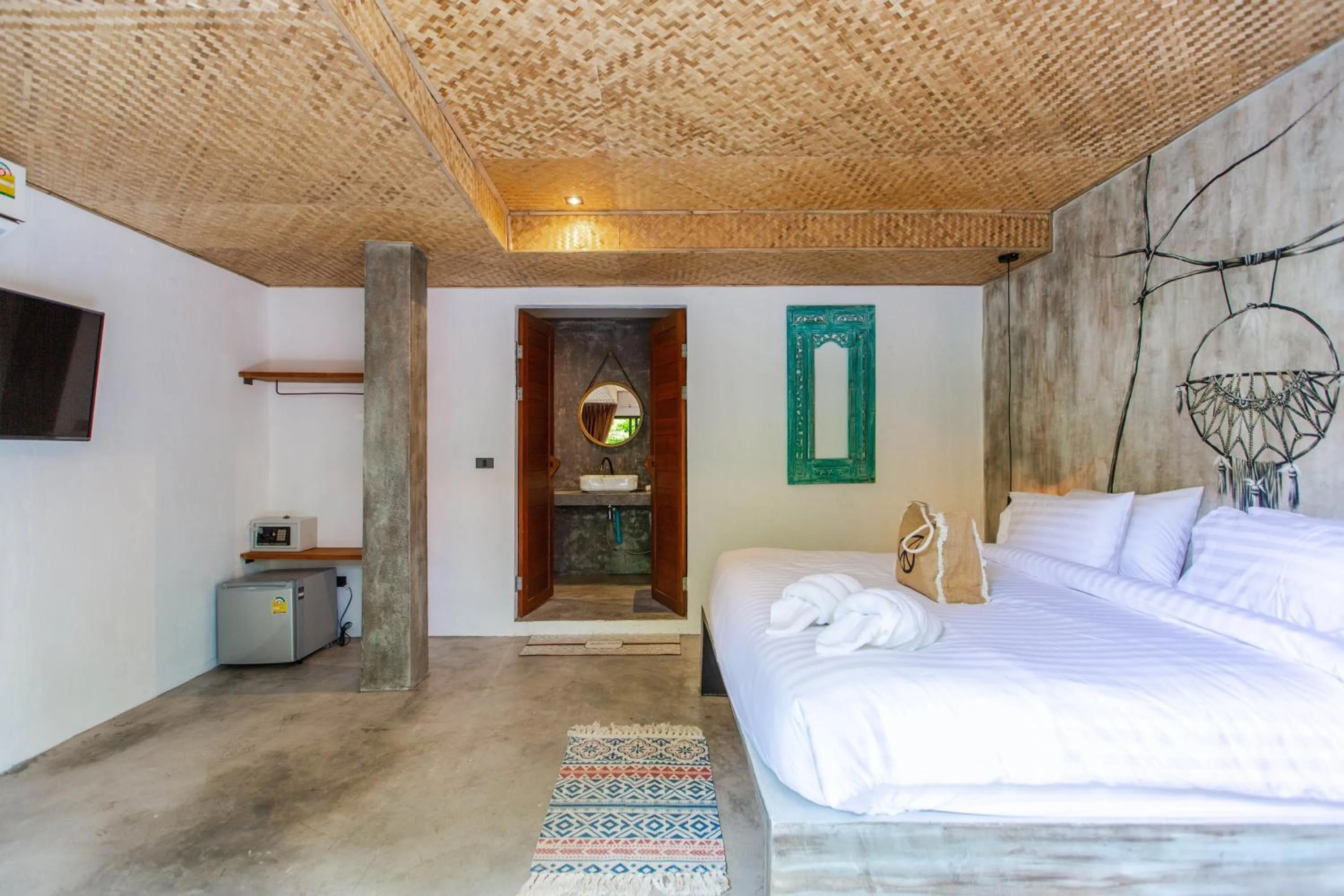 Bed in Dreamcatcher Boutique Hotel