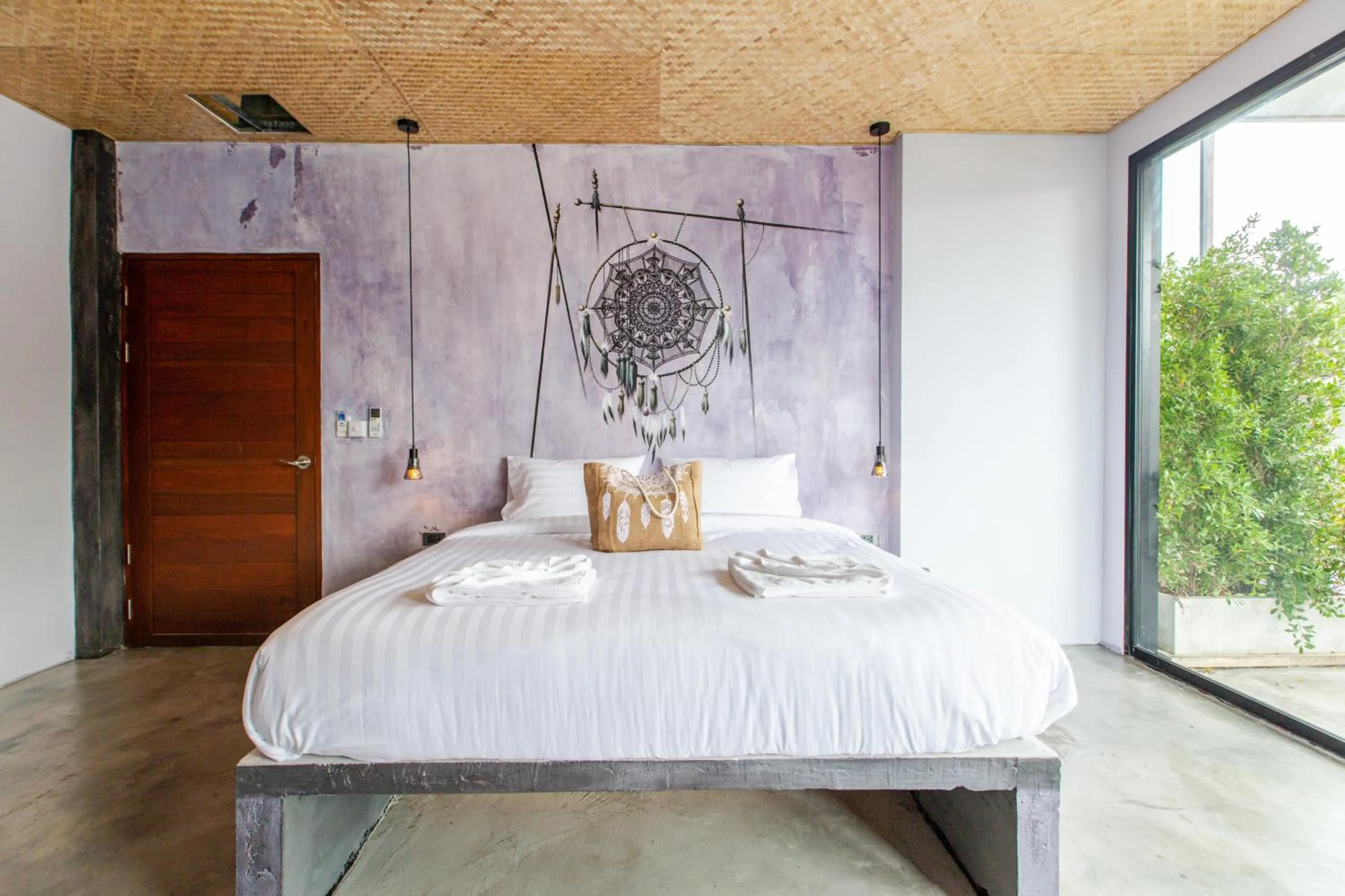 Bed in Dreamcatcher Boutique Hotel