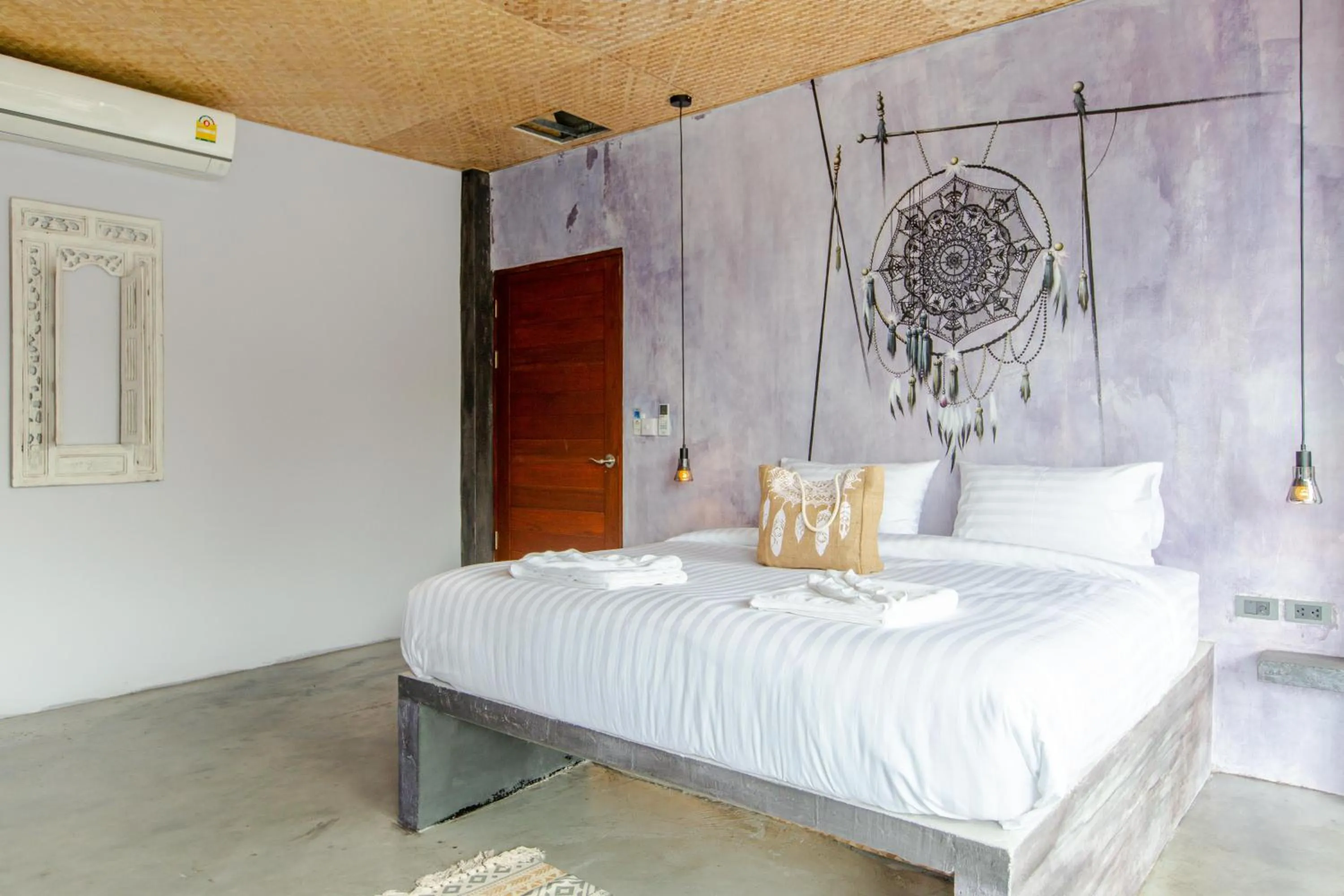Bed in Dreamcatcher Boutique Hotel