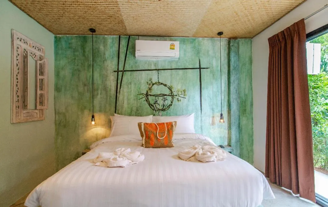 Bed in Dreamcatcher Boutique Hotel