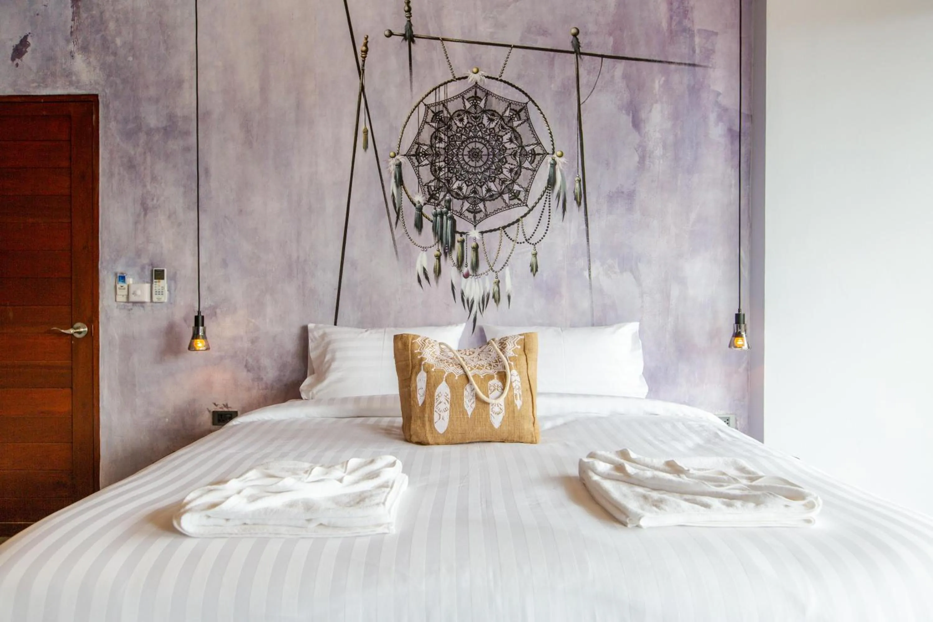 Bed in Dreamcatcher Boutique Hotel
