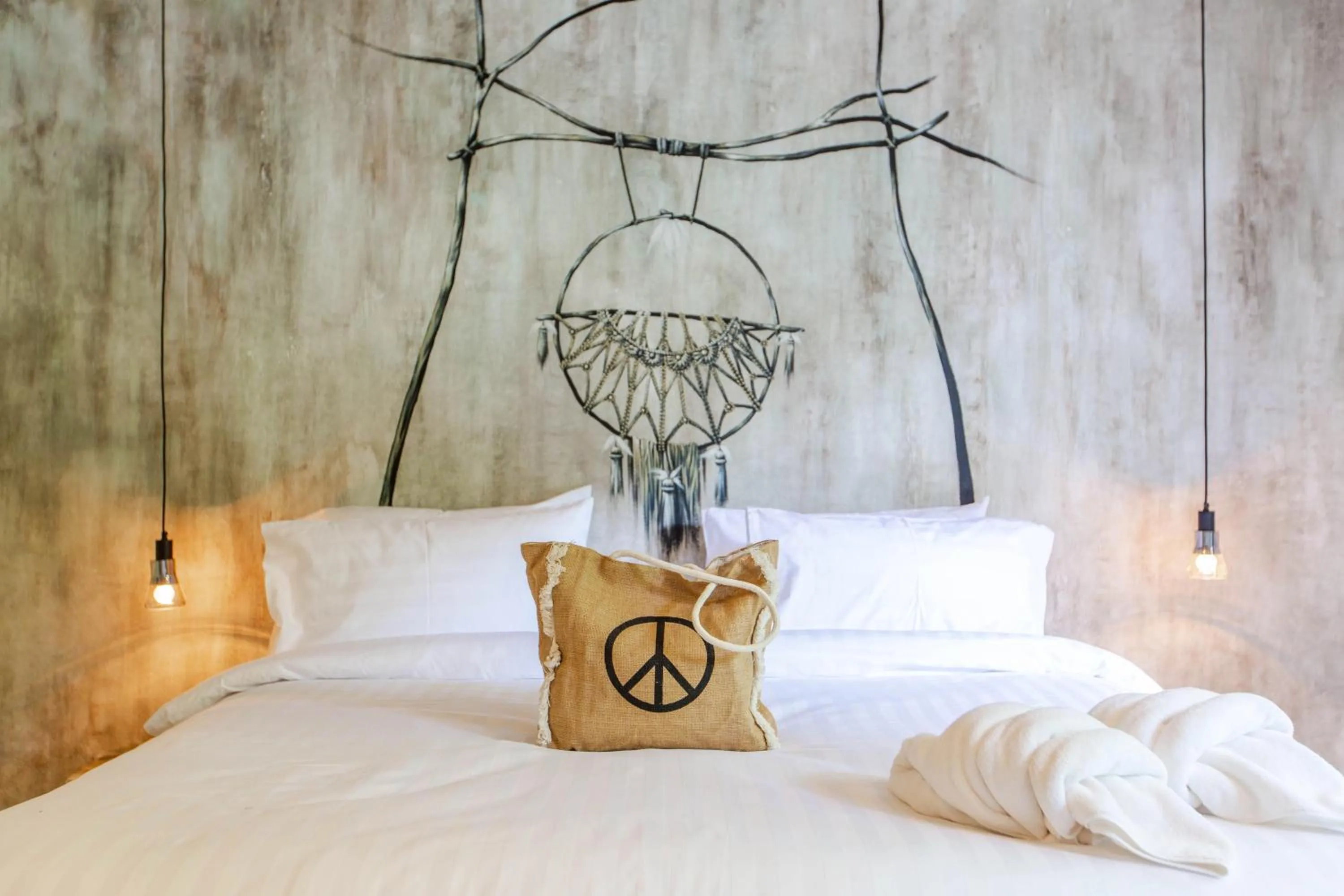 Bed in Dreamcatcher Boutique Hotel