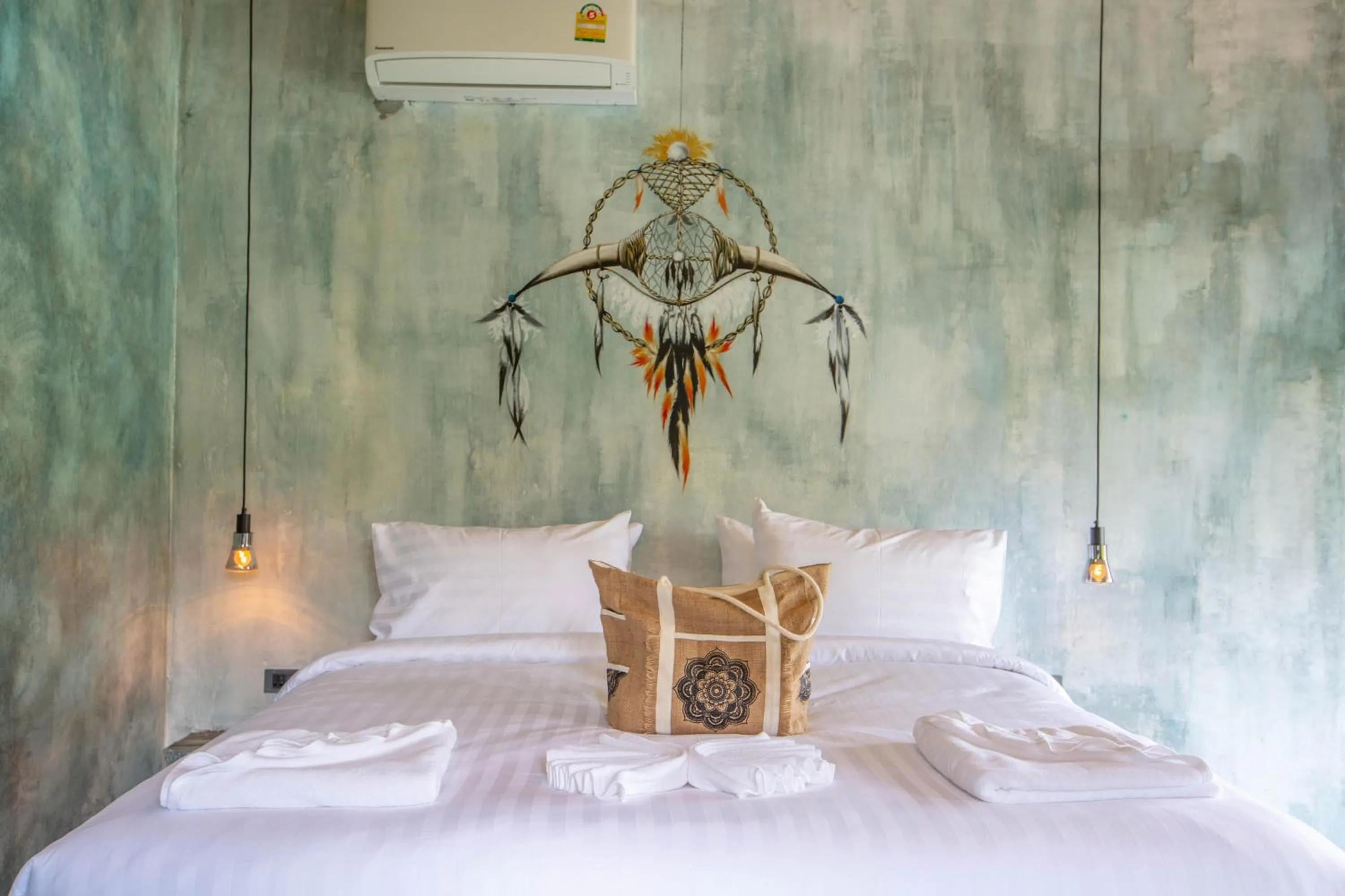 Bed in Dreamcatcher Boutique Hotel