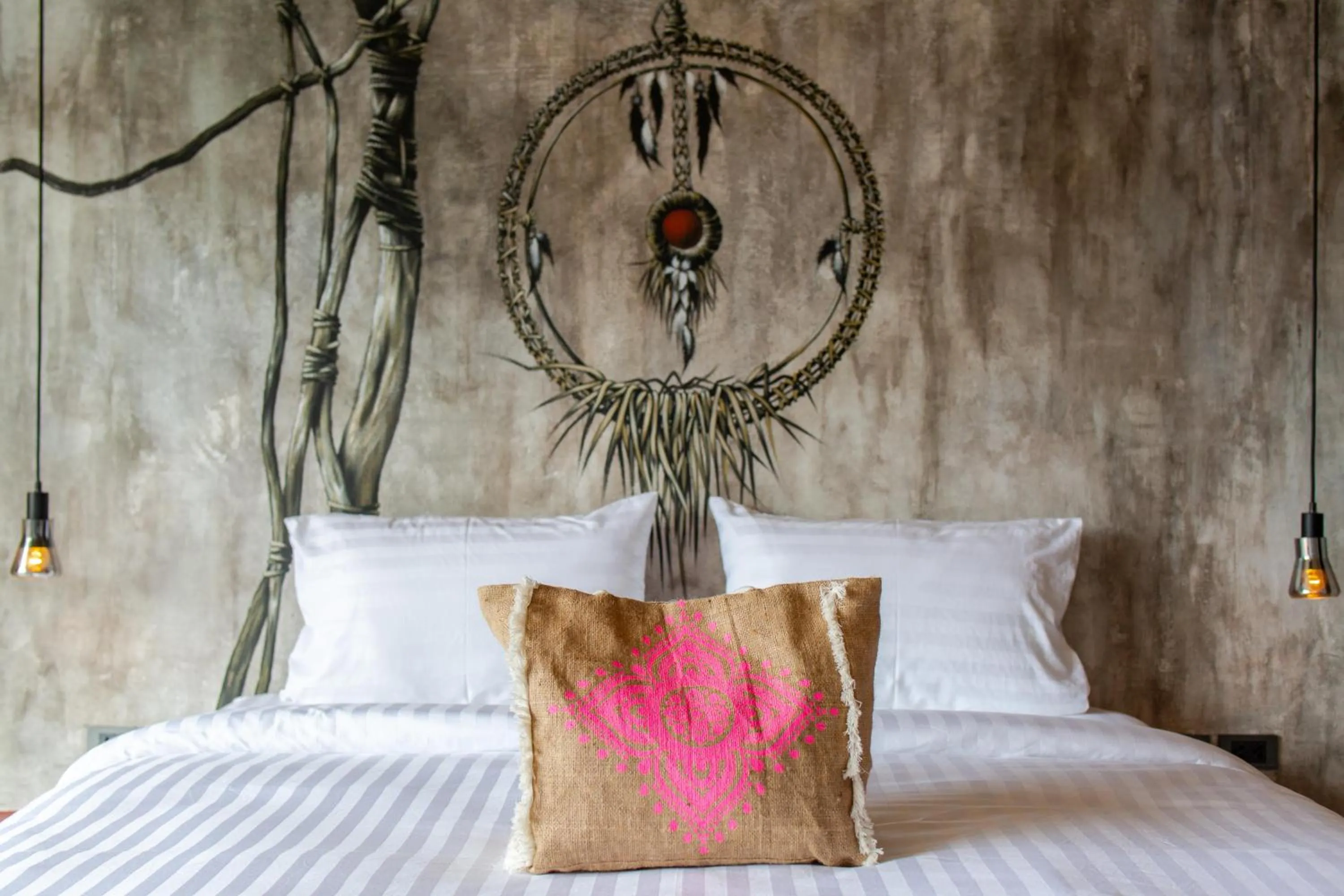 Bed in Dreamcatcher Boutique Hotel