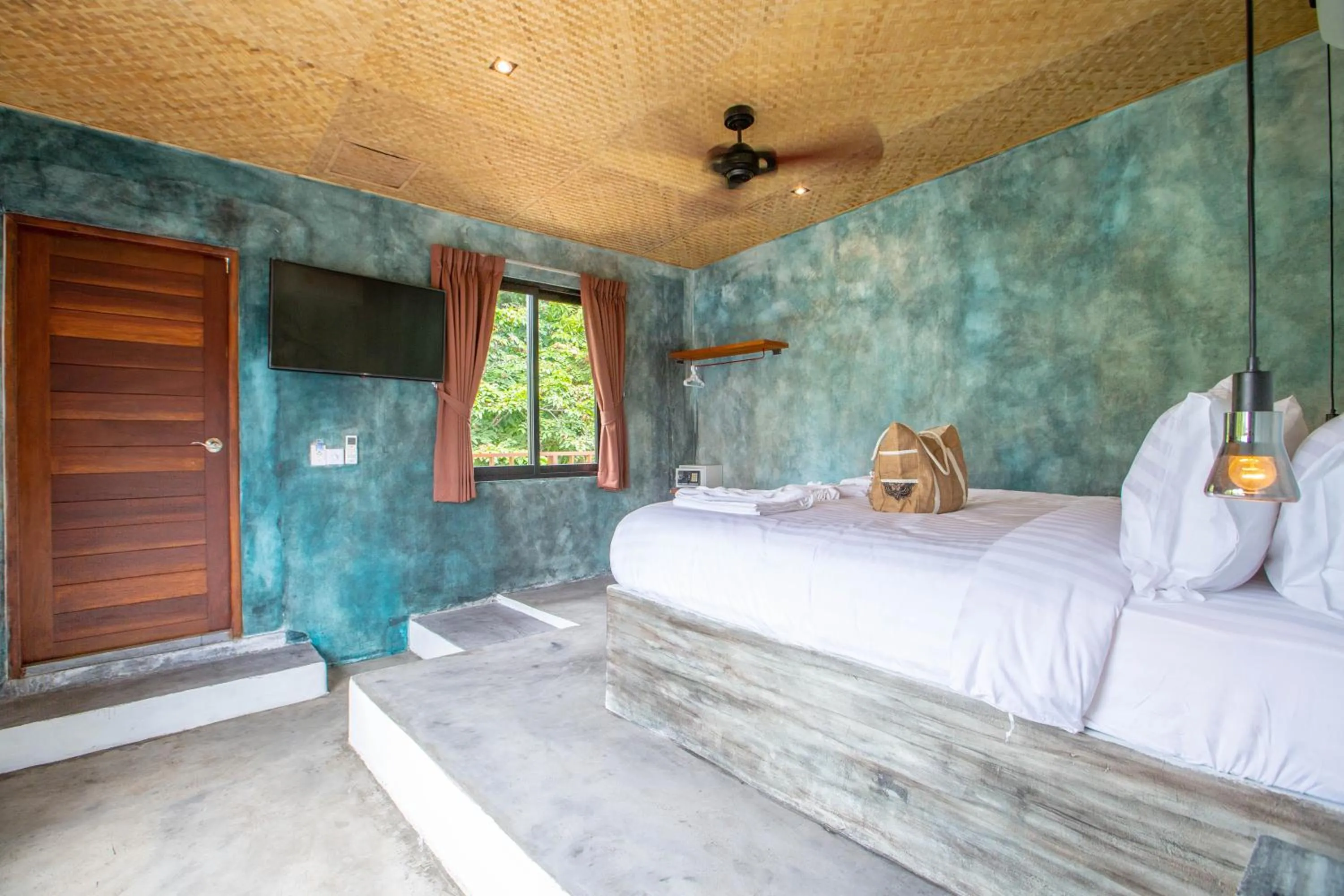 Bed in Dreamcatcher Boutique Hotel