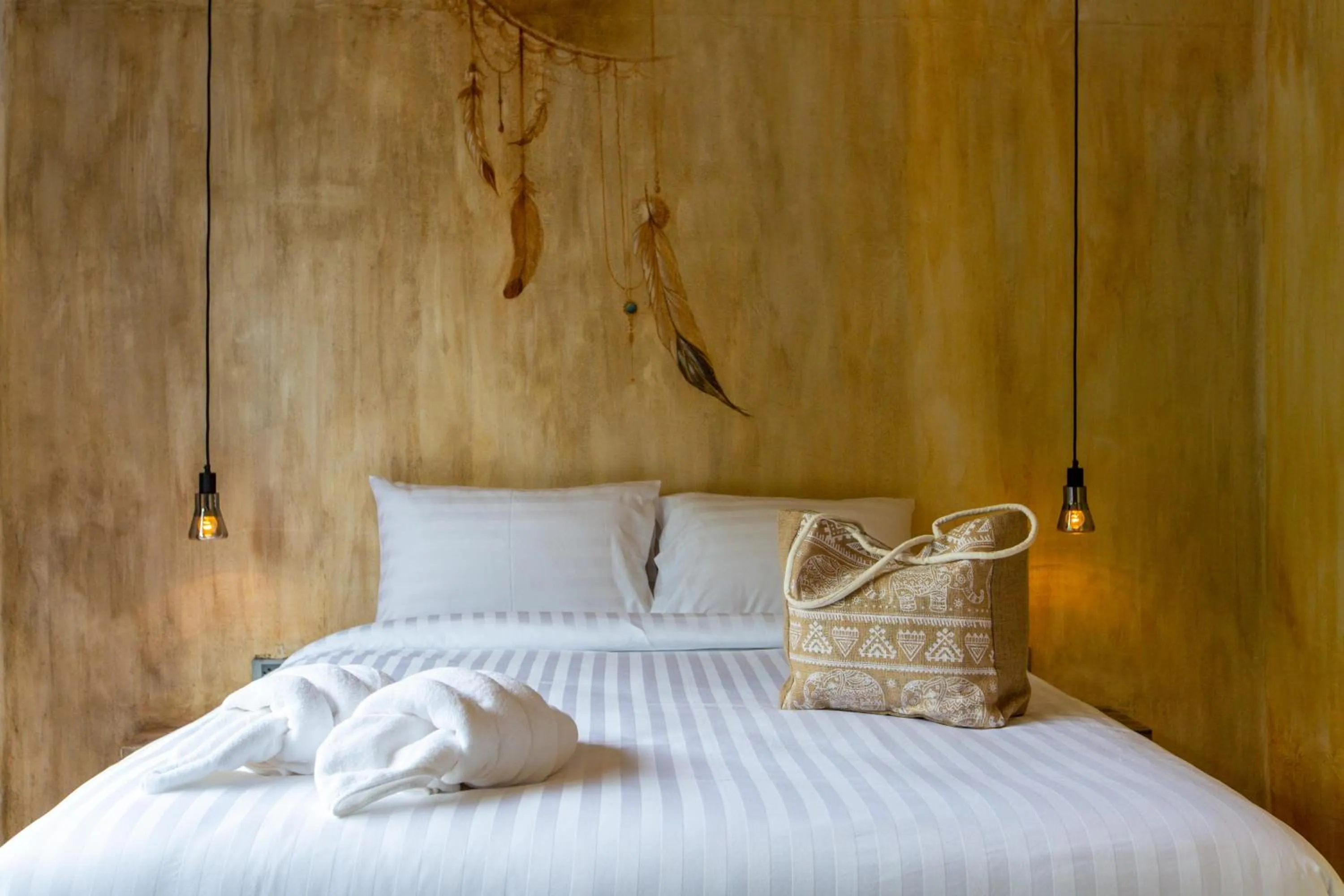 Bed in Dreamcatcher Boutique Hotel